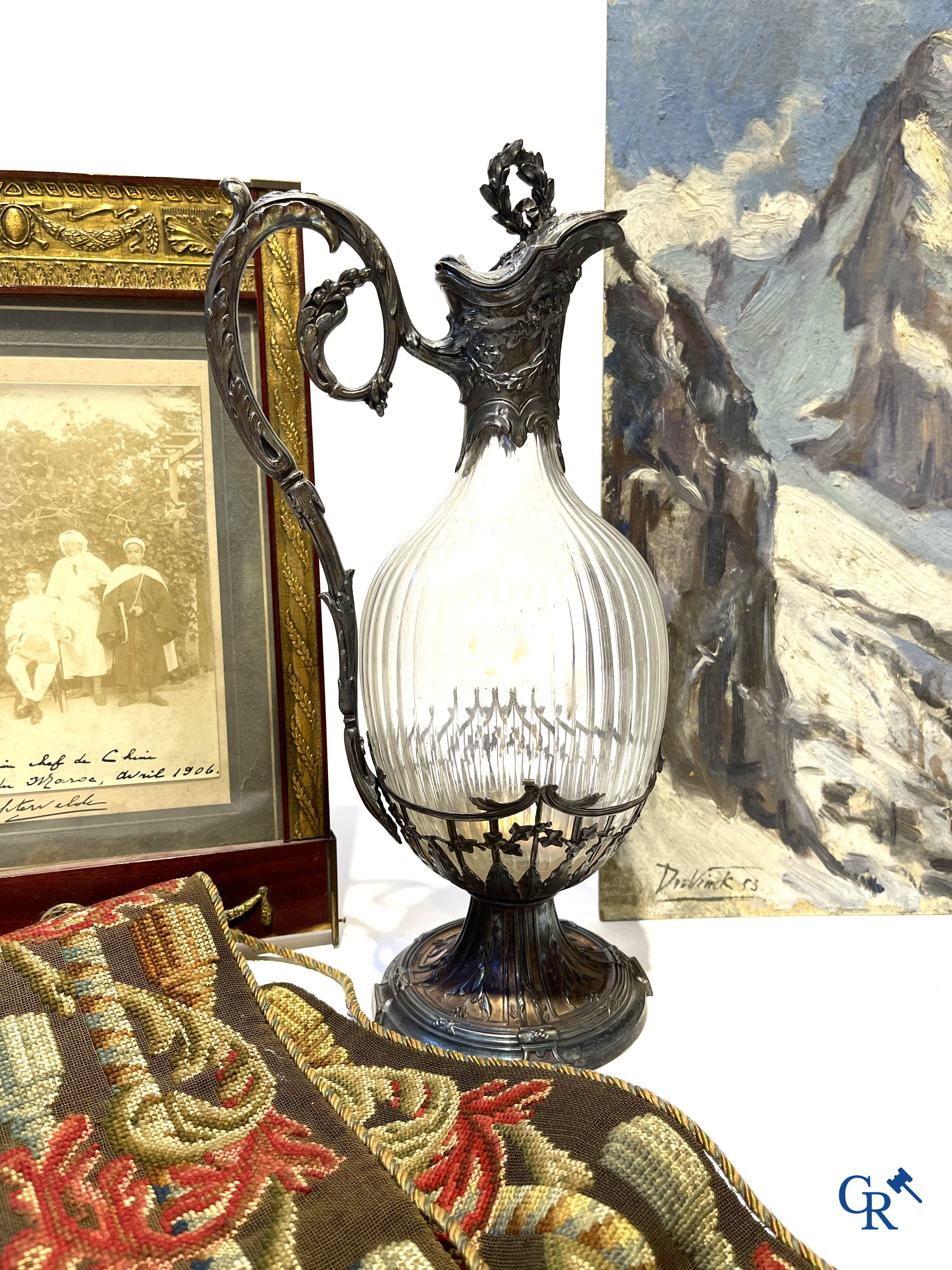 A nice lot of brocante, carafe with silver mounts, painting, wooden bust, old photo, etc.