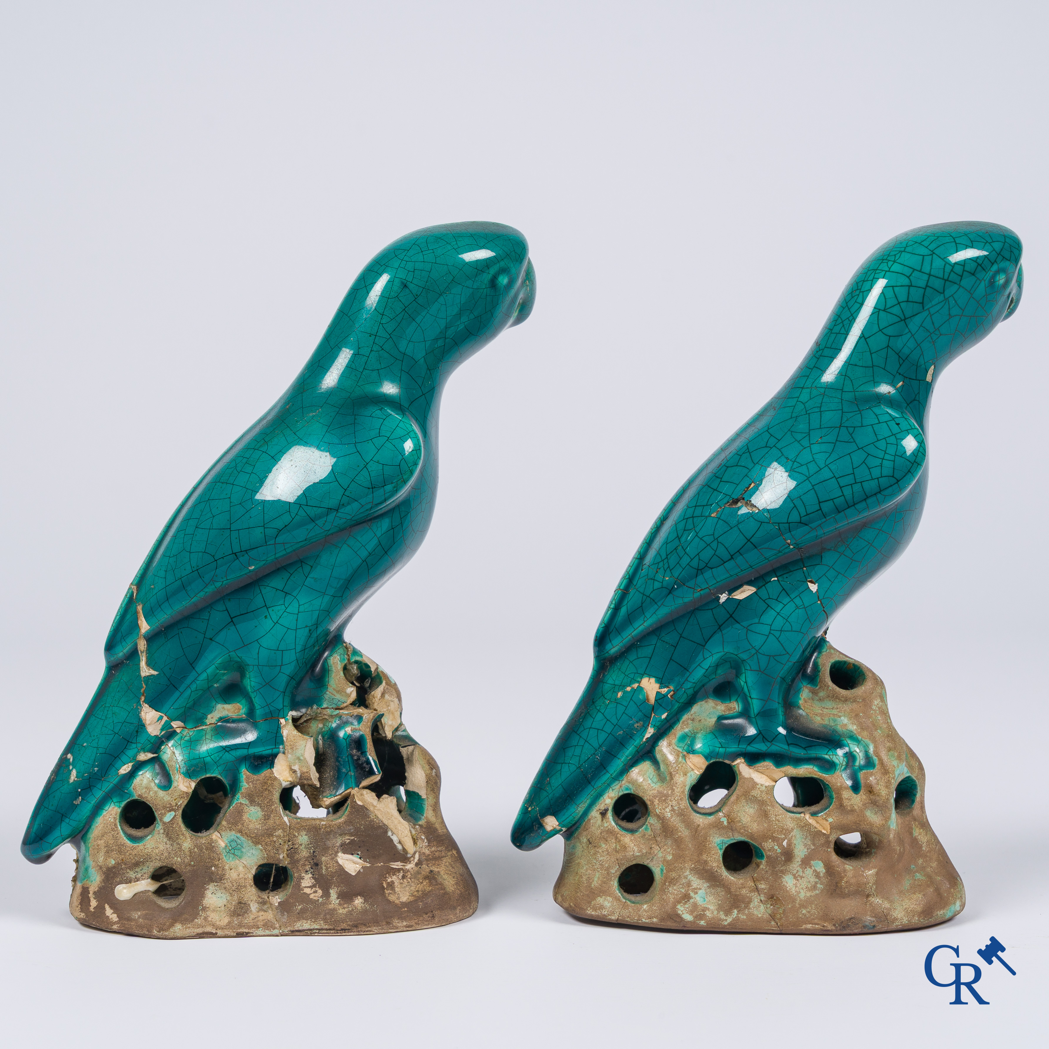 Asian Art, a pair of turquoise glazed ceramic parrots.
