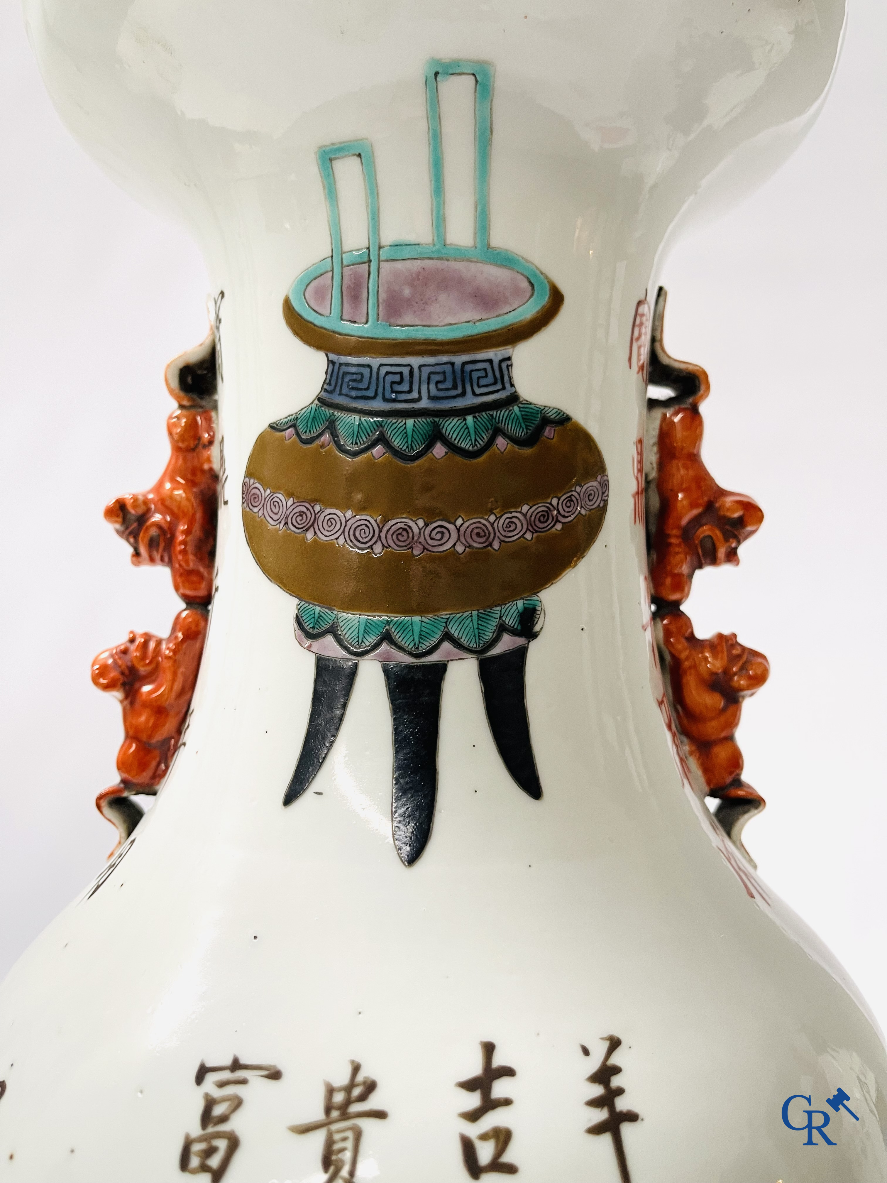 Asian Art, 2 Chinese famille rose vases decorated with antiques and a calligraphic text. 19th century.