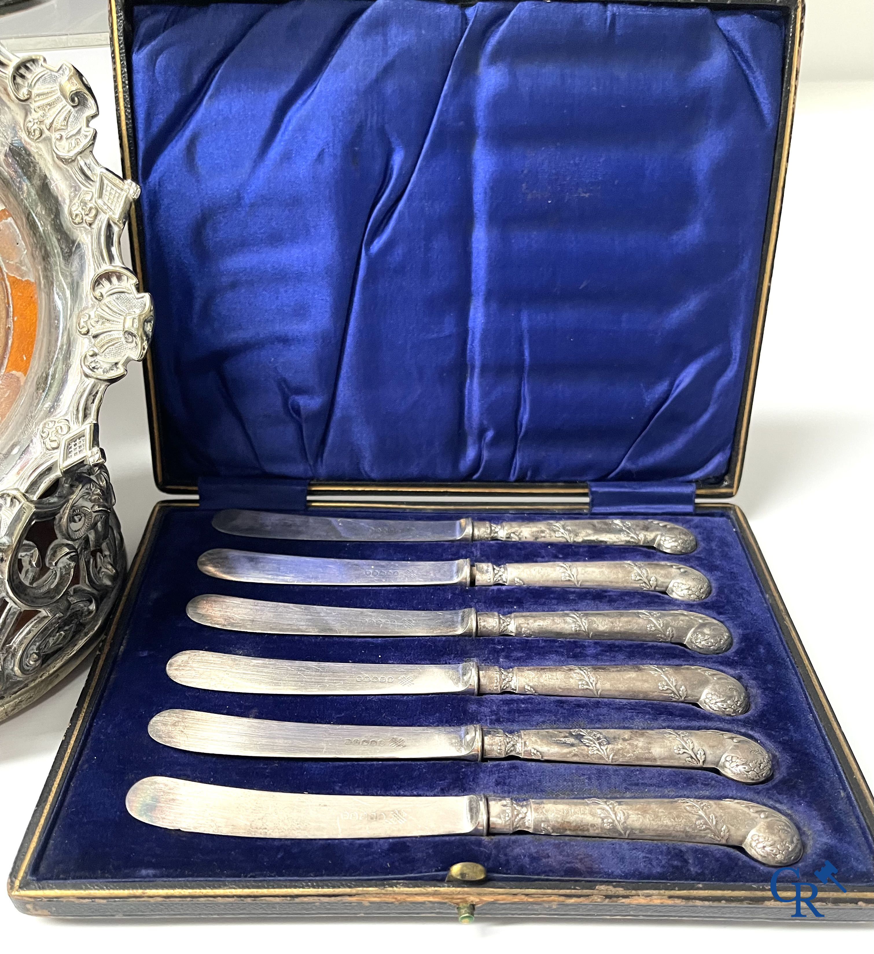 A set of 10 silver-plated metal table bells, a carafe with silver frame, silver napkin rings, a sprinkler bus, etc.