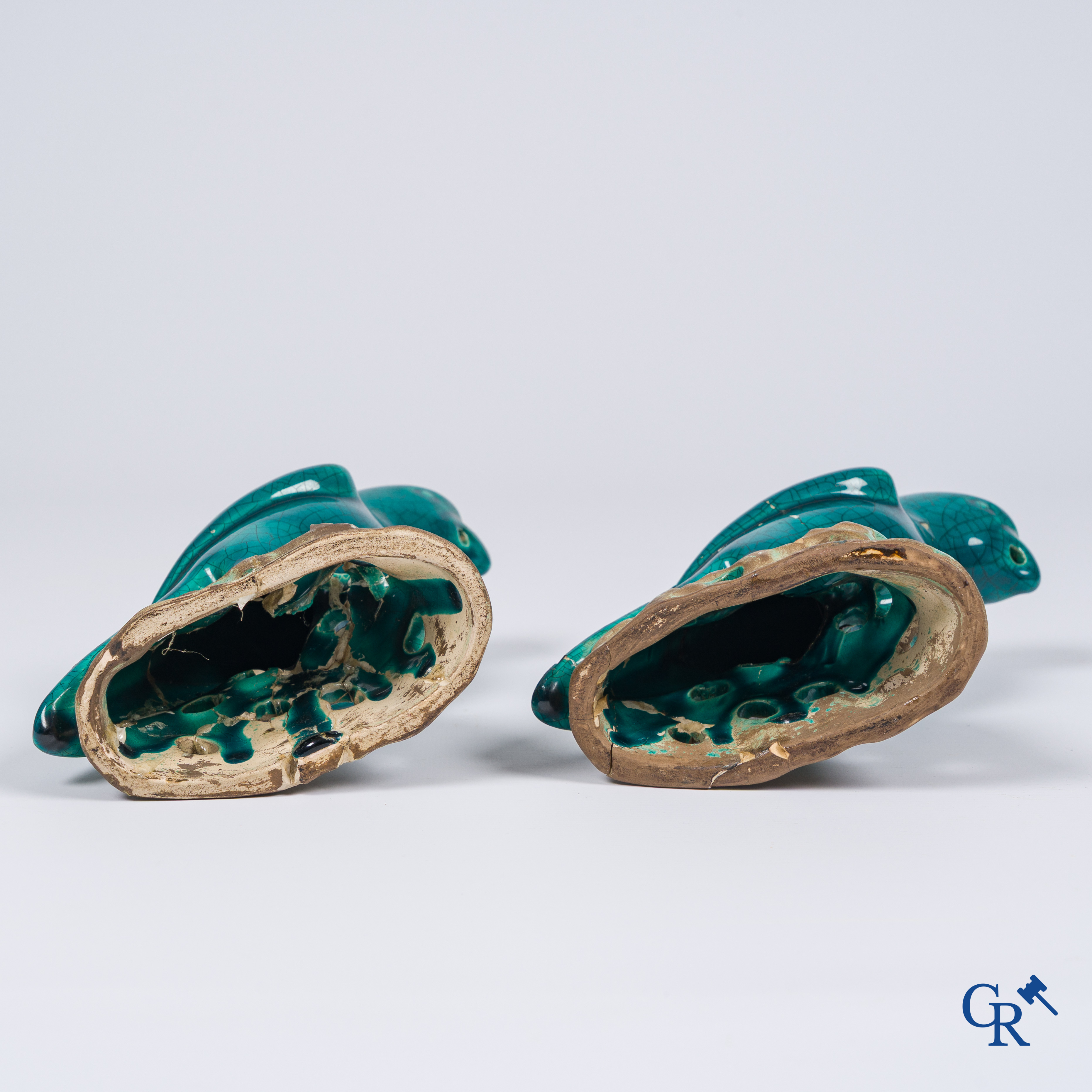 Asian Art, a pair of turquoise glazed ceramic parrots.