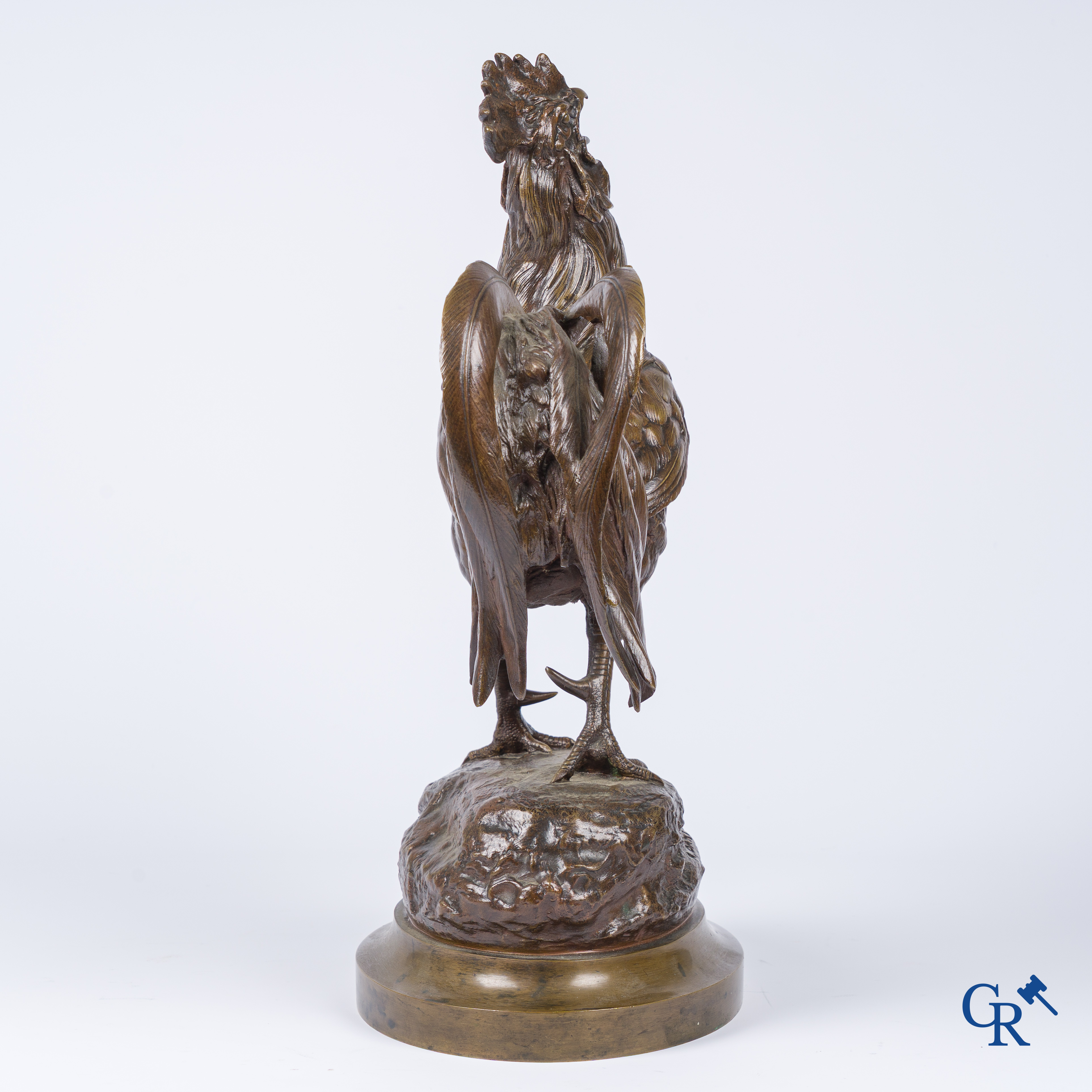 A Barye. Bronzen haan met bruine patine. Gesigneerd. 19e eeuw.