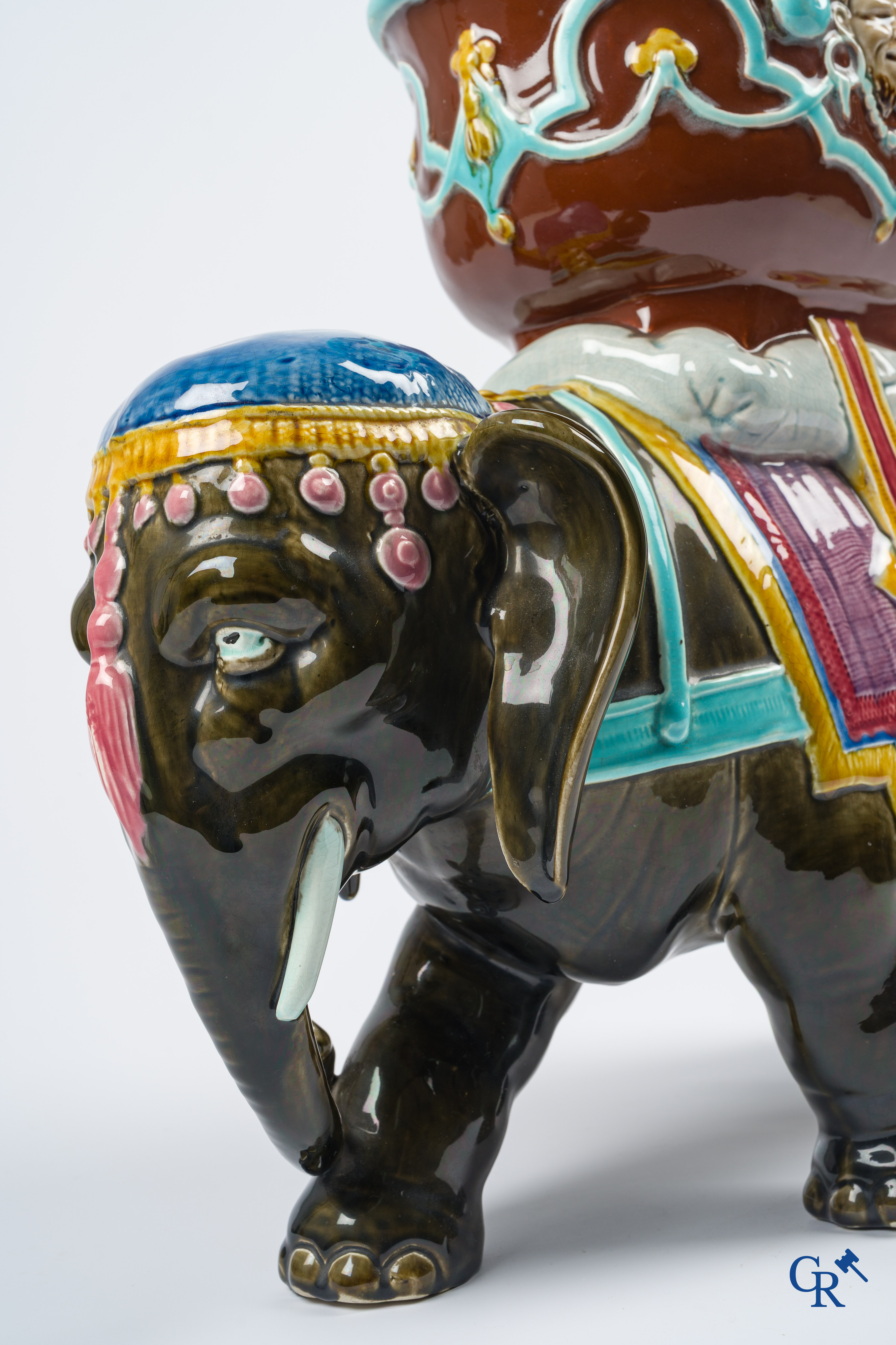 Orchies. A large elephant in multicolored decorated pottery, barbotine. France, circa 1900.