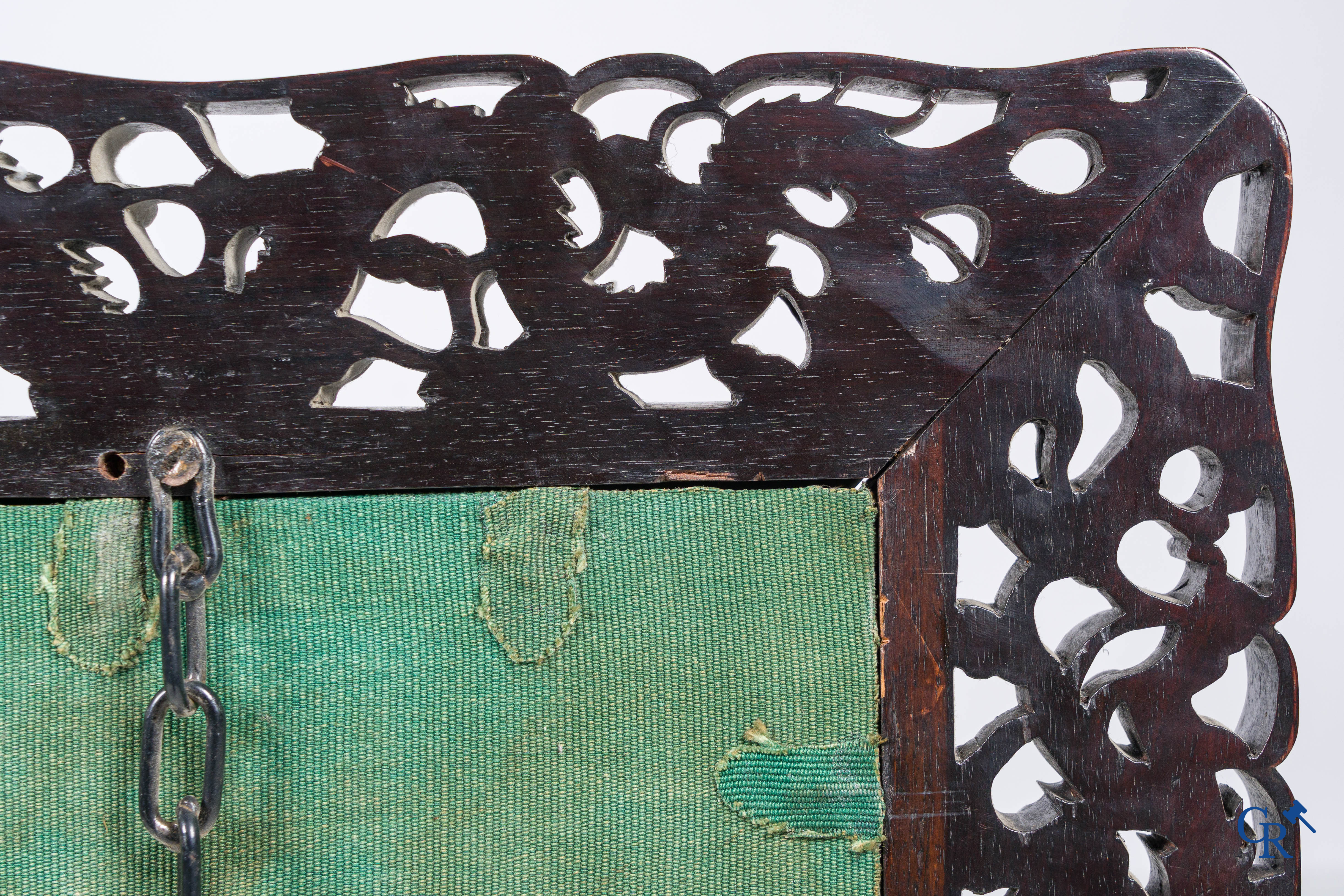 Asian Art, a large mirror in carved Chinese hardwood. 19th century.