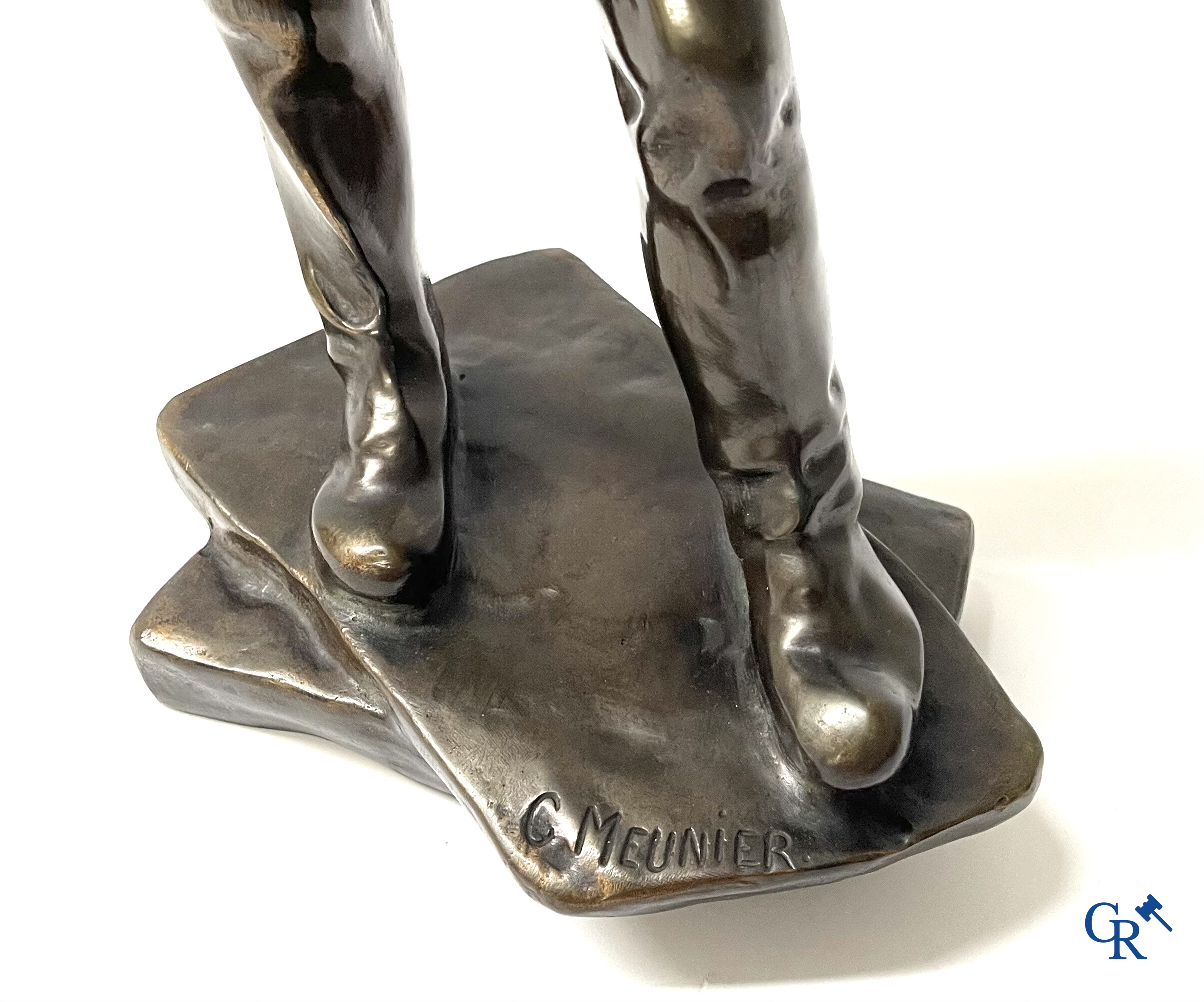 Constantin Emile Meunier (1831-1905) (after) A pair of bronze statues with brown patina, "Le Mineur" and "Le débardeur".