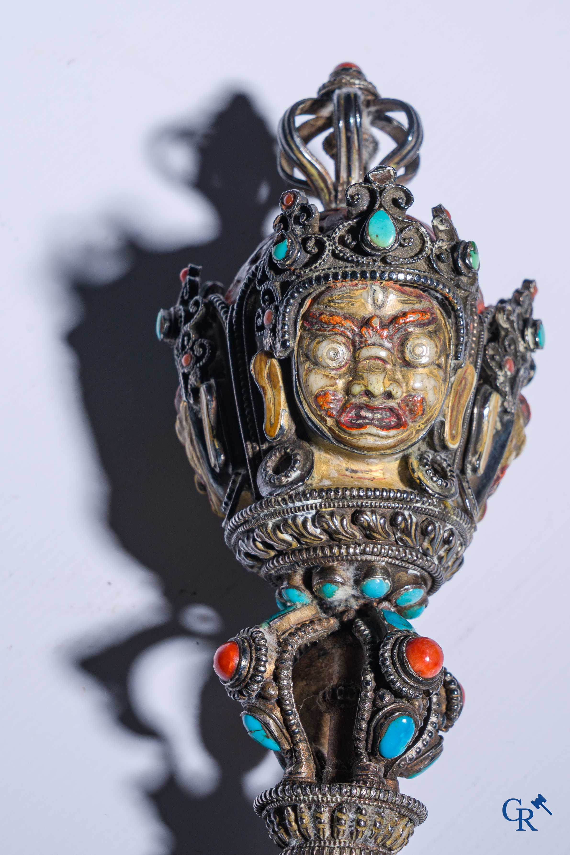 Asian Art, Phurba. Tibetan ritual dagger in silver, inlaid with turquoise and red coral.