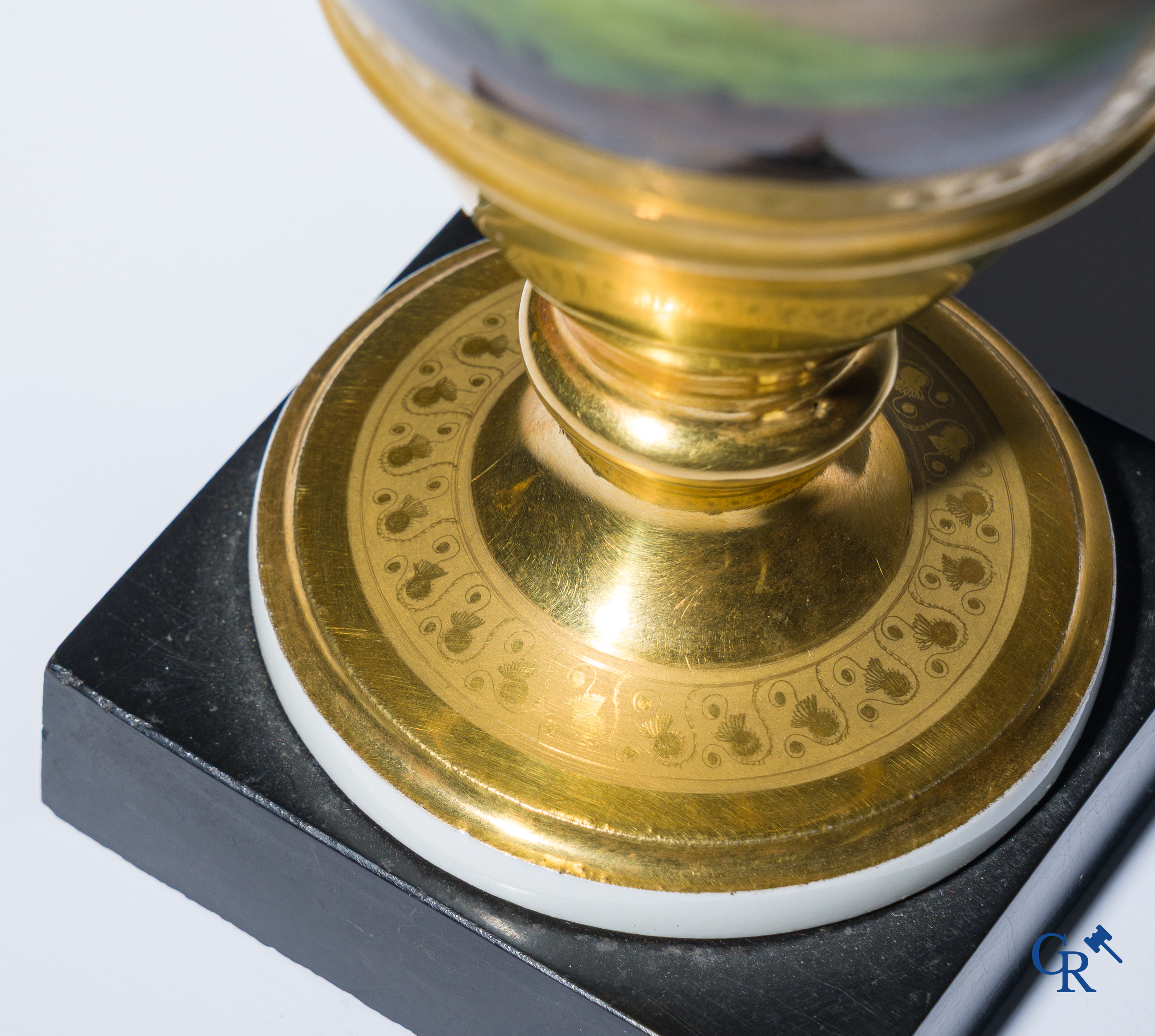 Empire, a pair of finely gilded and decorated vases in porcelain and biscuit on a marble pedestal, Circa 1810.