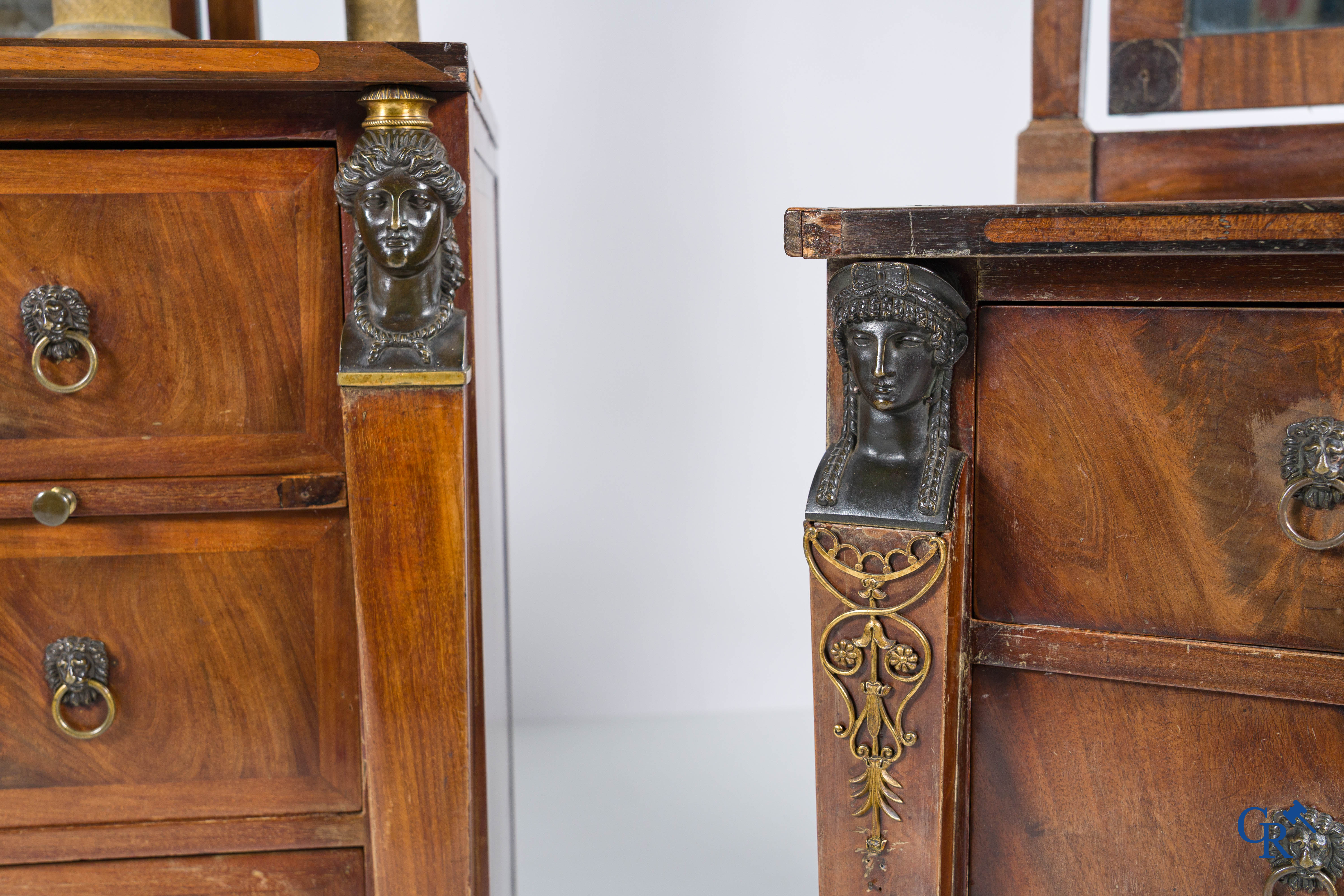Chapuis, a mahogany wooden men's dressing table and ladies' dressing table with chiseled bronzes. Empire, circa 1810.