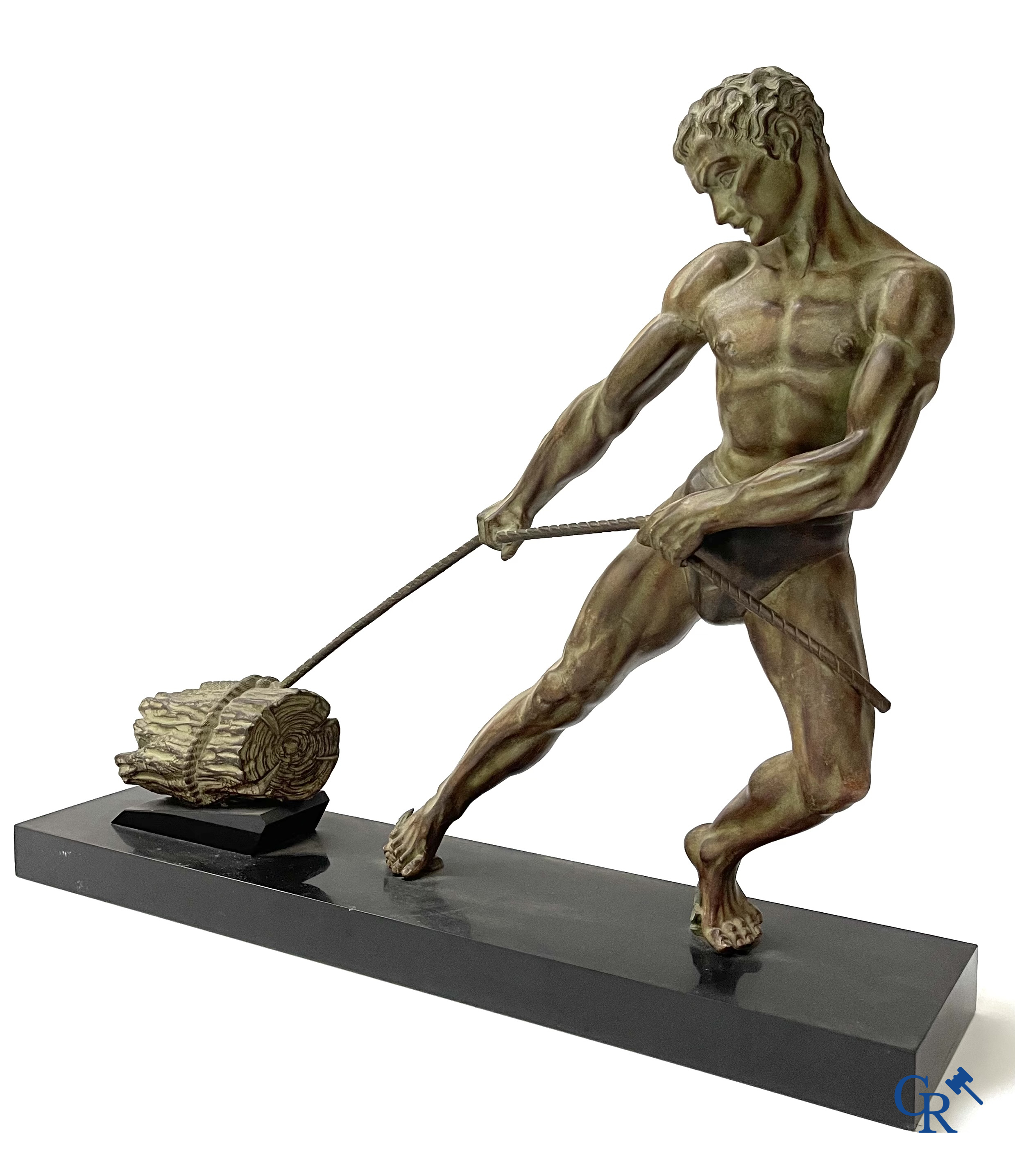 Art deco, a statue in green-brown patinated spelter on a black marble base. Around 1930.