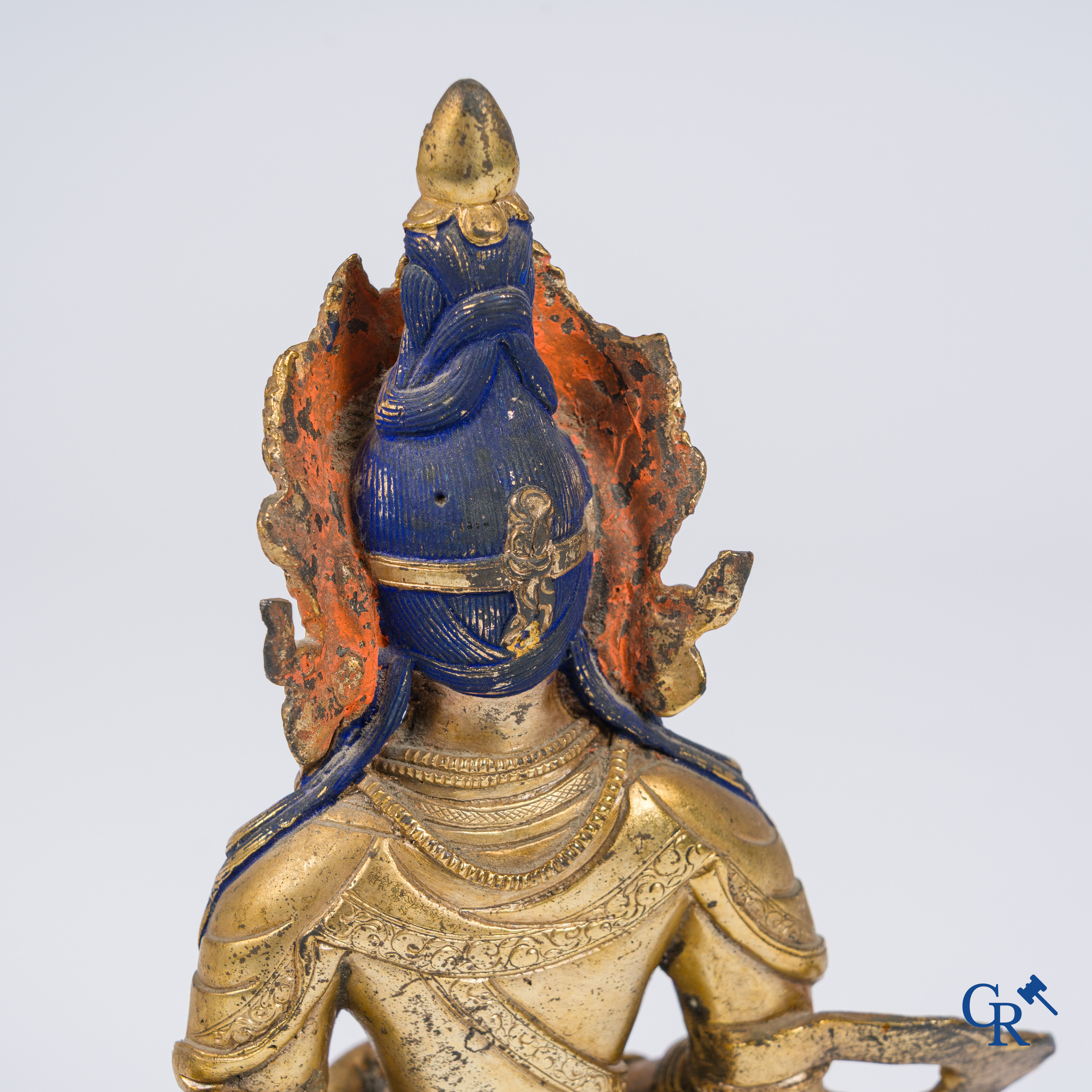 Asian Art, Tibet, a Chinese gilded Buddha Amitayus. Bronze with turquoise and coral inlay.