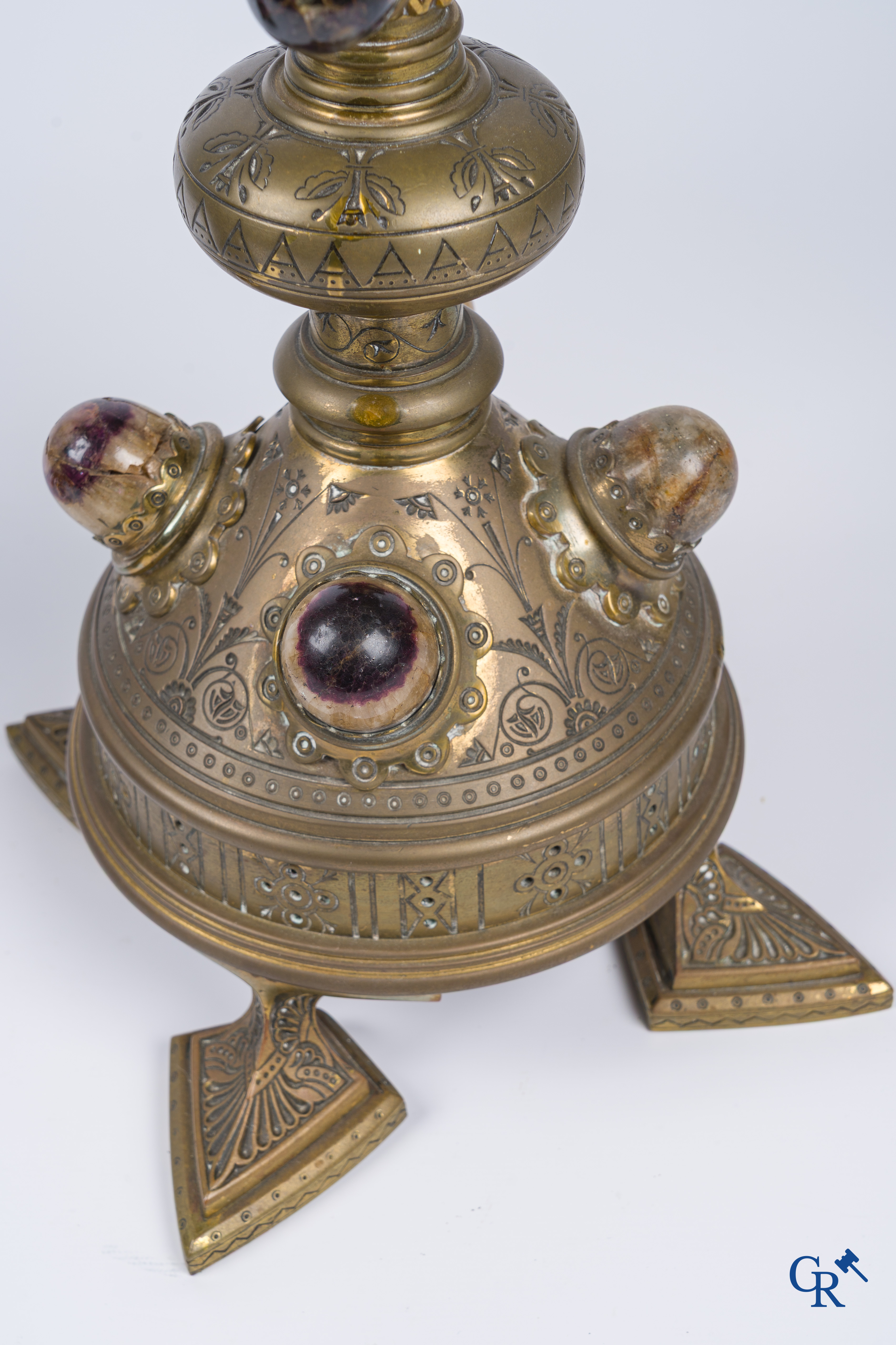 A pair of important bronze candlesticks decorated with various types of rock including amethyst. 19th century.