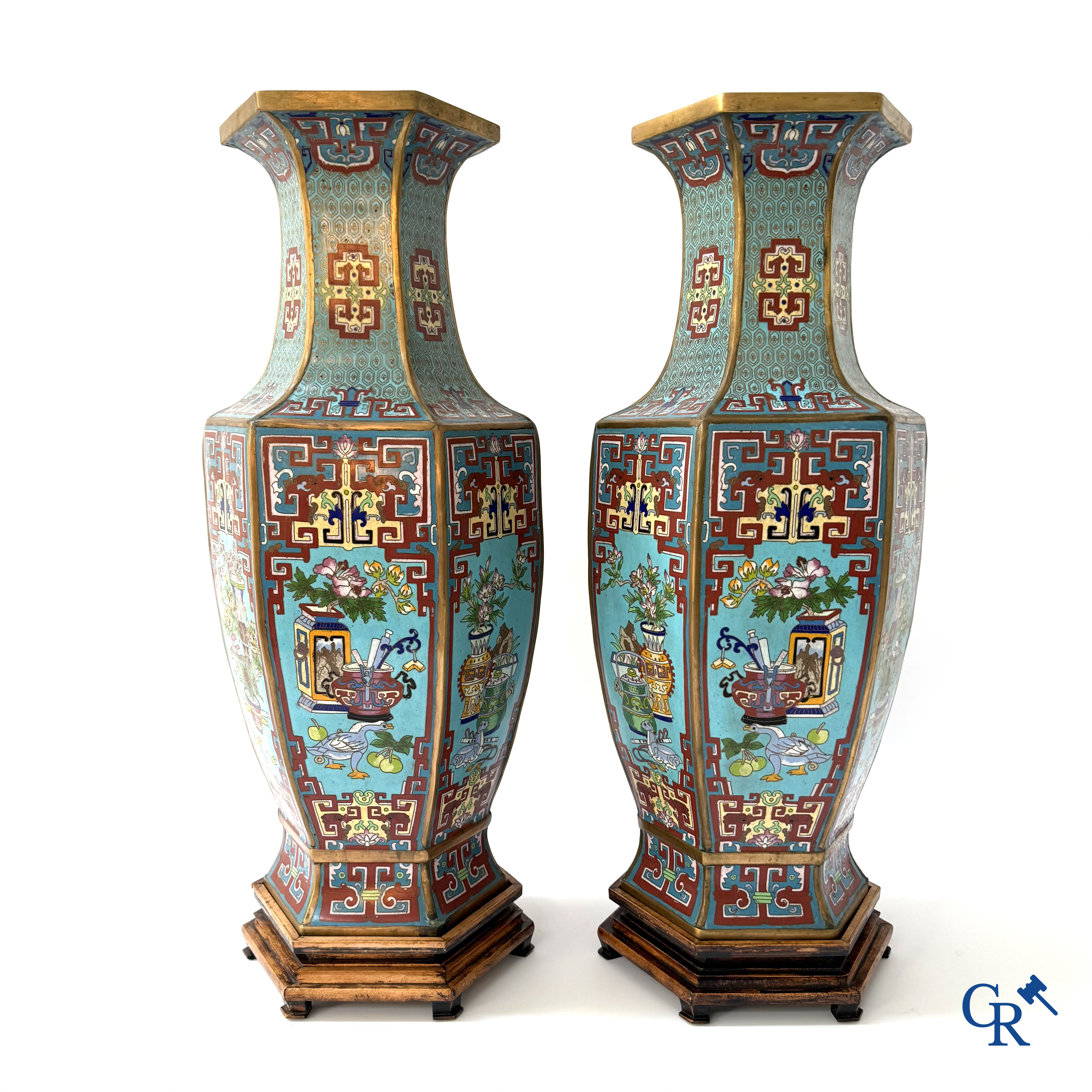 Asian Art, a large pair of hexagonal Chinese cloisonné vases with a decor of antiques.