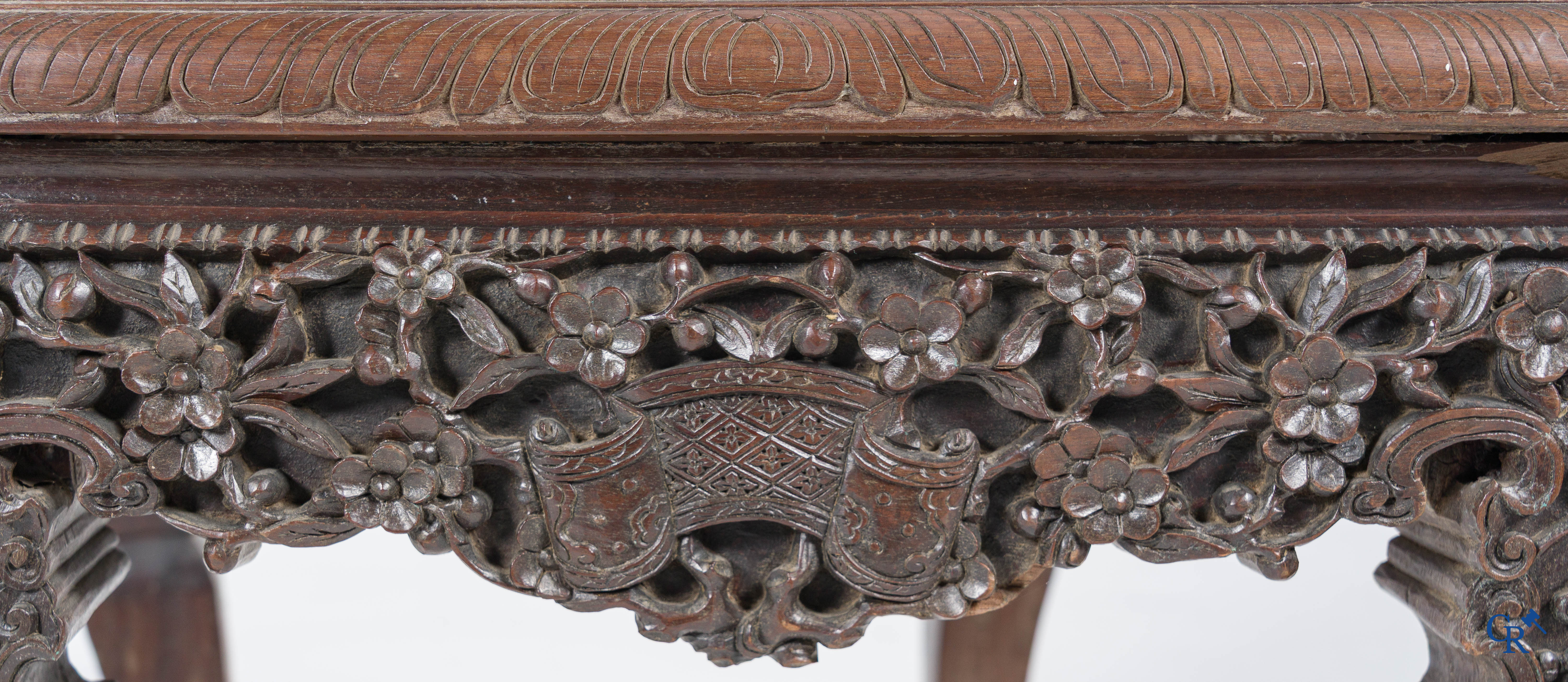 Asian Art, A pair of richly carved chairs with bats, dragons and flowers in Chinese hardwood. 19th century.