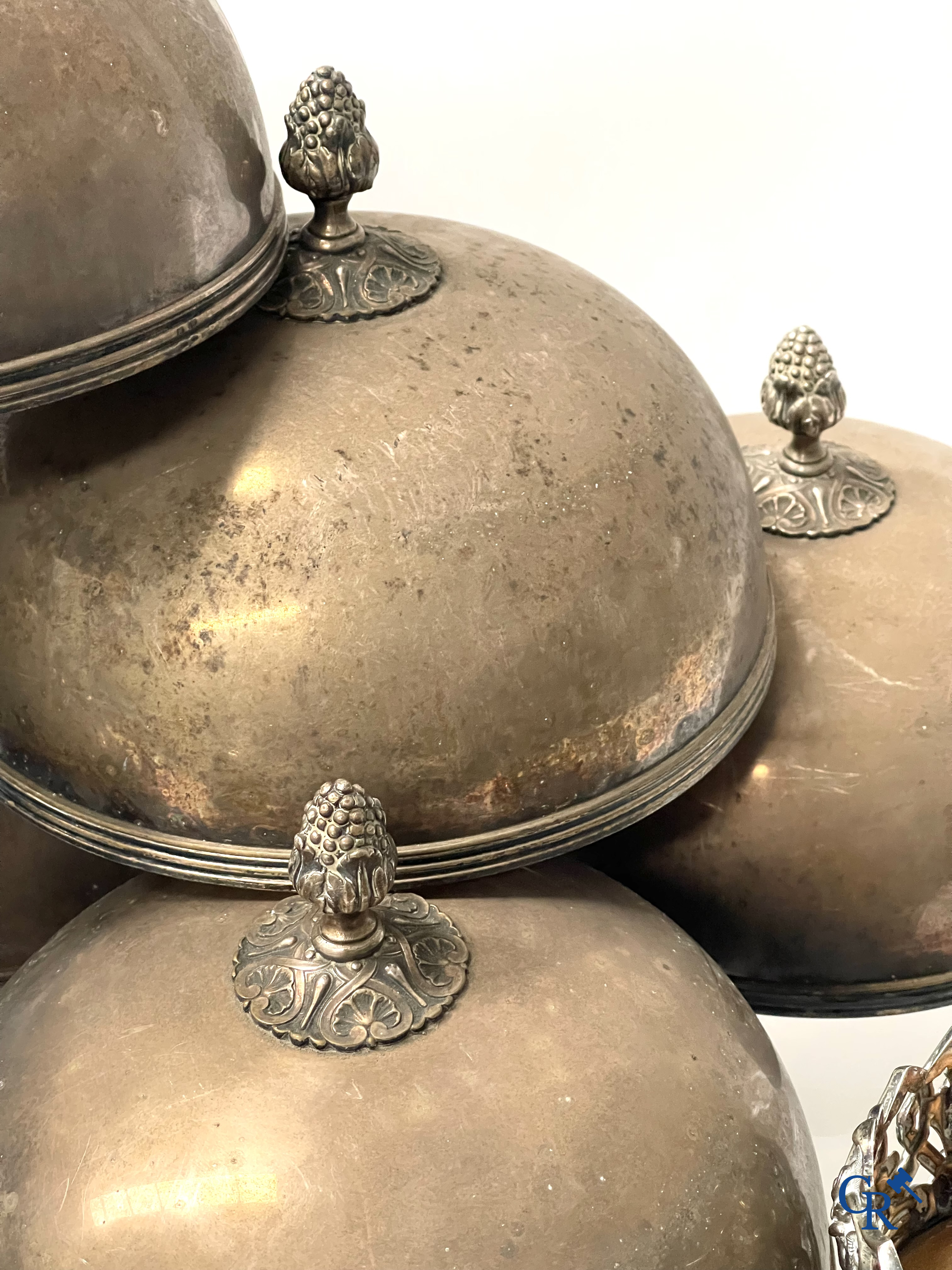 A set of 10 silver-plated metal table bells, a carafe with silver frame, silver napkin rings, a sprinkler bus, etc.