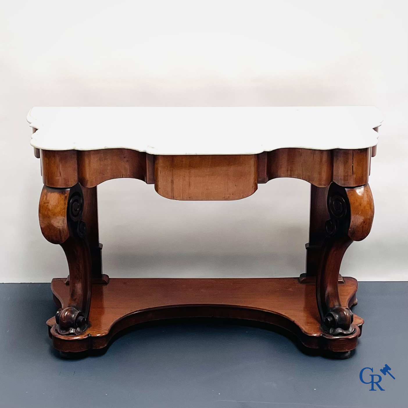 Een console met lade in mahoniehout en marmer. Louis Philippe periode.