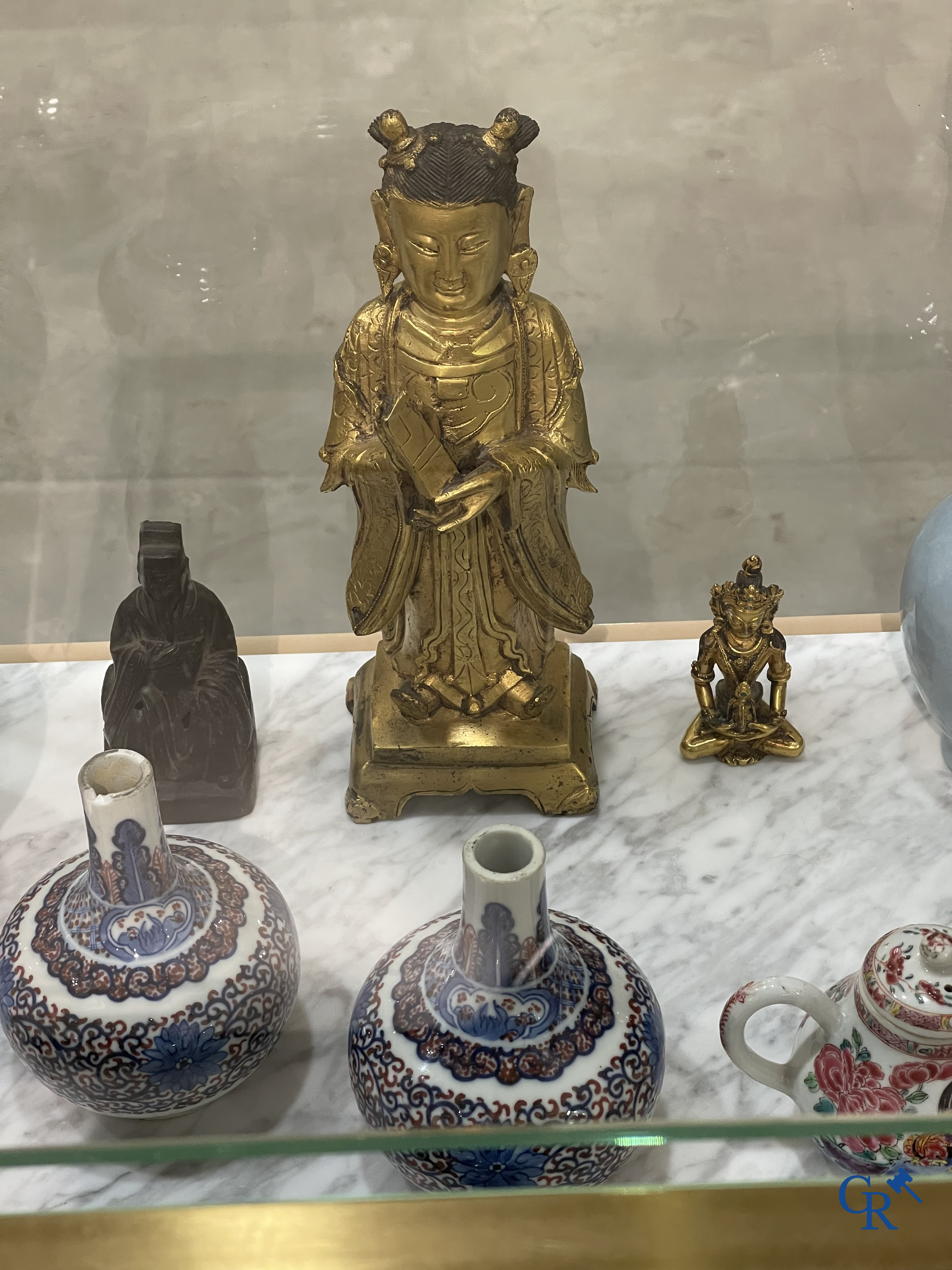 Asian Art, a seated bronze Buddha, Ming.