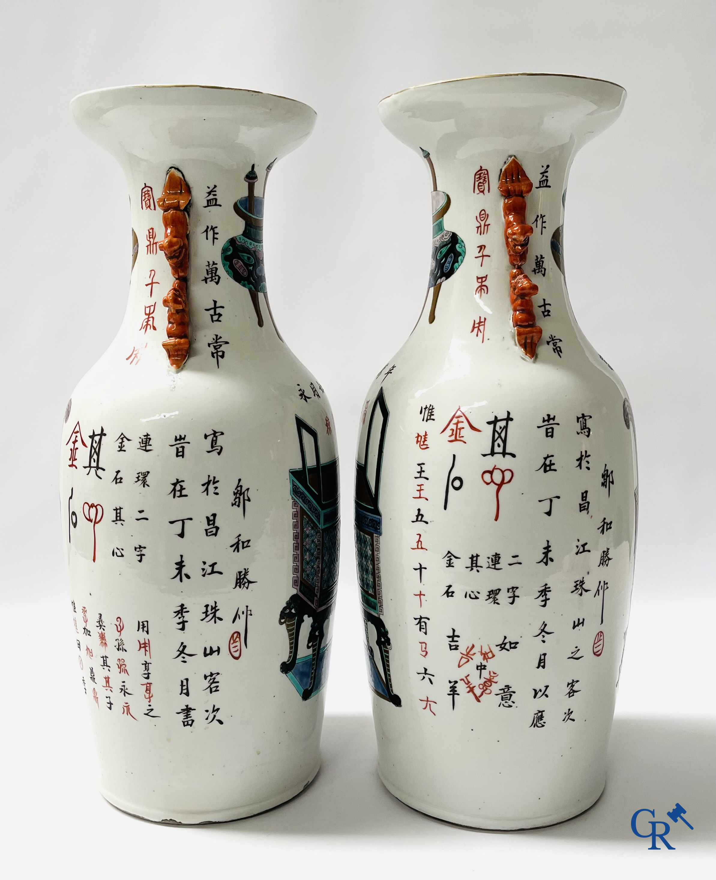 Asian Art, 2 Chinese famille rose vases decorated with antiques and a calligraphic text. 19th century.