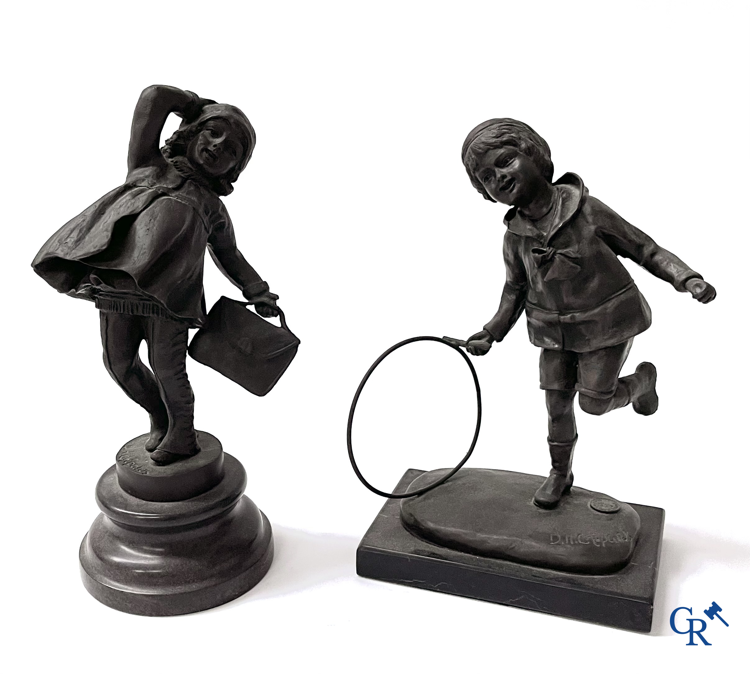 A bronze group after Raoul Larche with 5 children and a basket and 2 bronze statuettes after Chiparus. Posthumous 20th century.