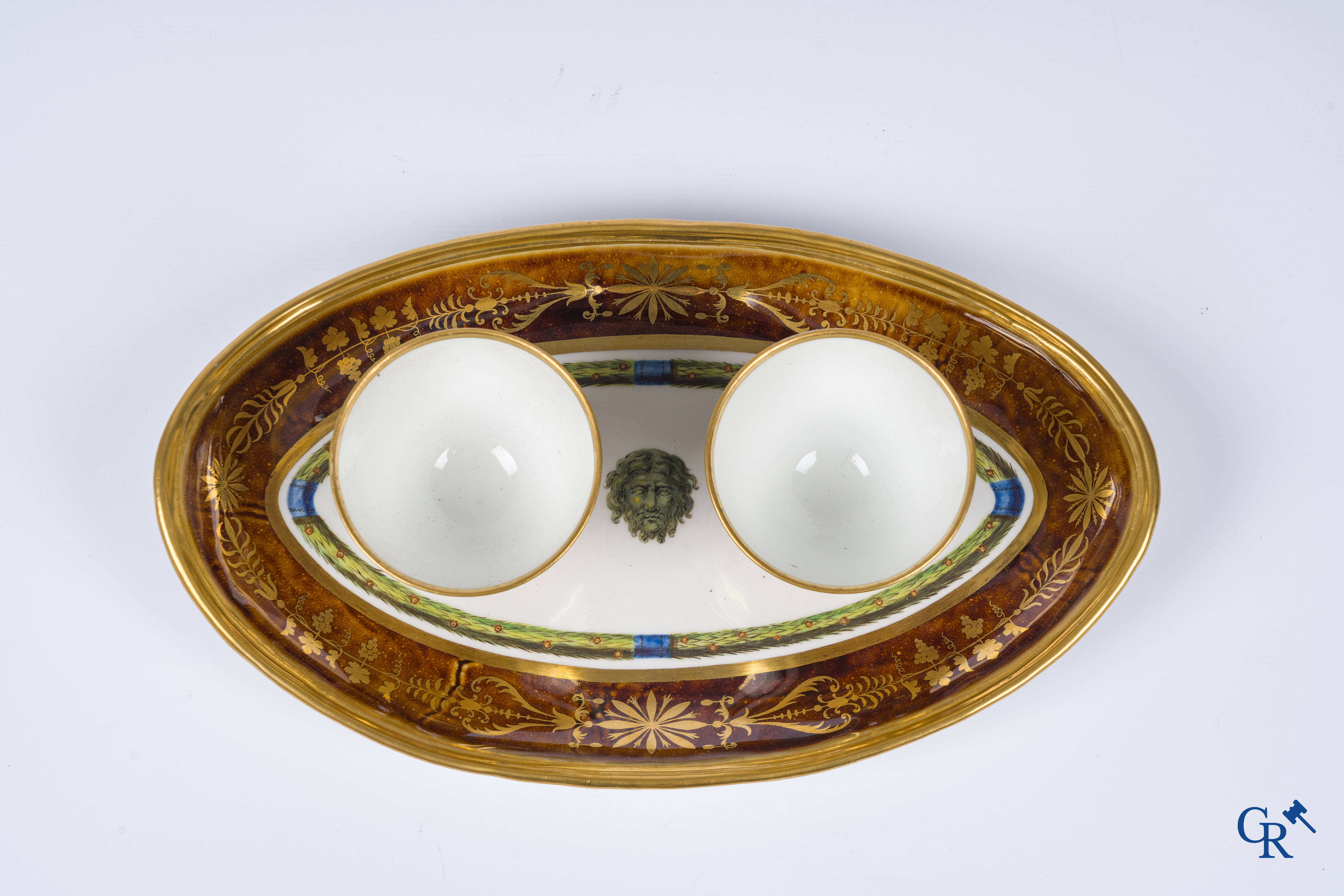 Manufacture nationale de Sèvres. Oval Sèvres tortoiseshell-ground form piece. Consulate, circa 1802.