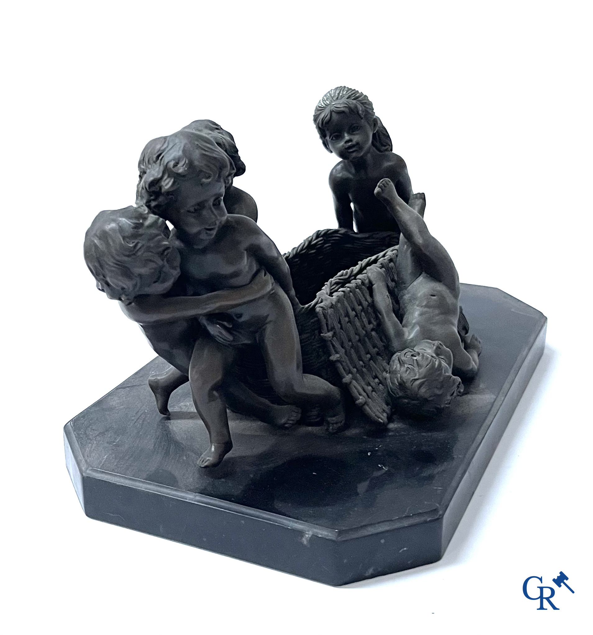 A bronze group after Raoul Larche with 5 children and a basket and 2 bronze statuettes after Chiparus. Posthumous 20th century.