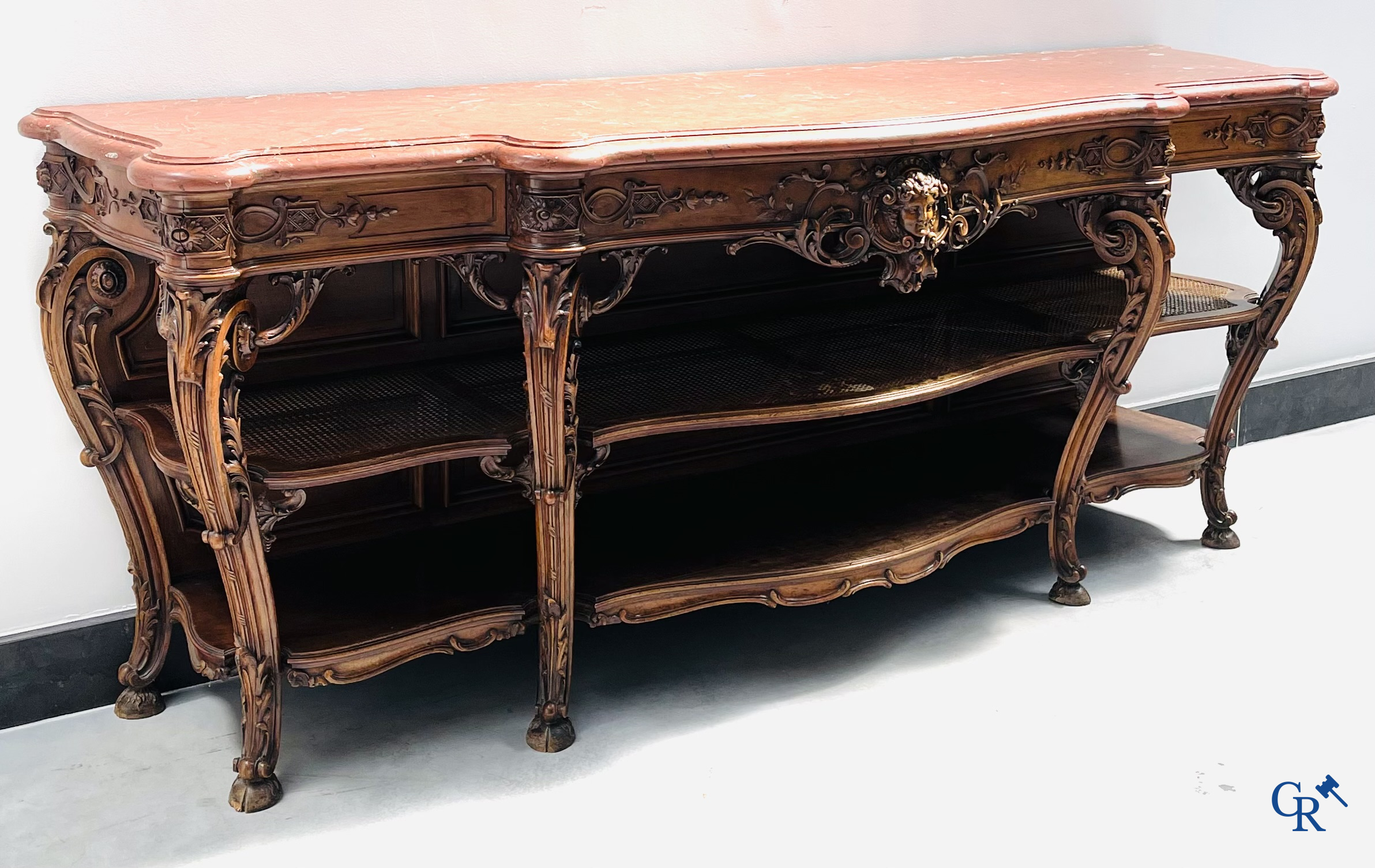 Maison Roll, 42, Rue Faubourg St. Antoine Paris. An exceptionally dessert furniture in carved walnut. LXVI style.