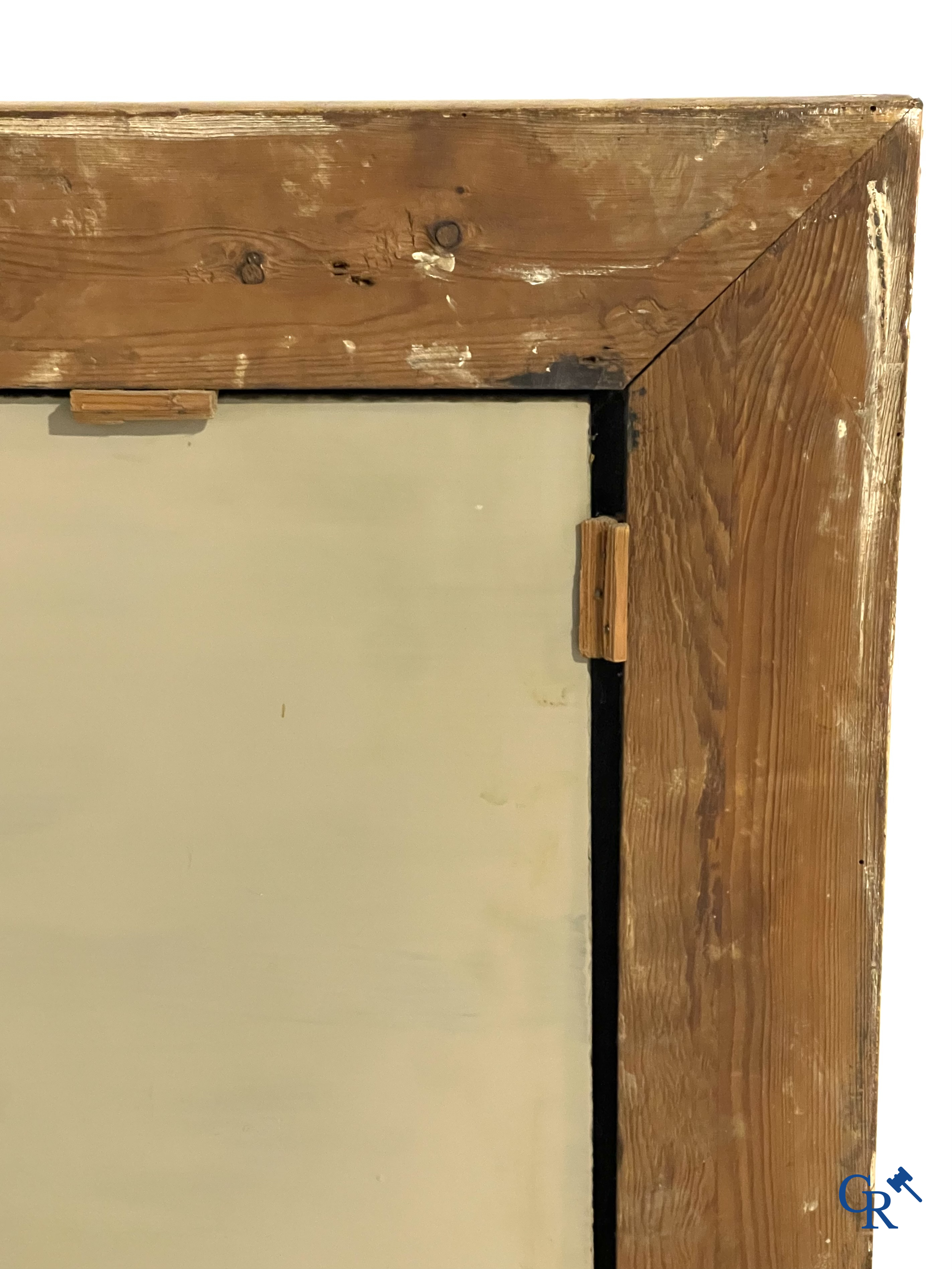 A large gilded fireplace mirror in LXVI style. Circa 1920.