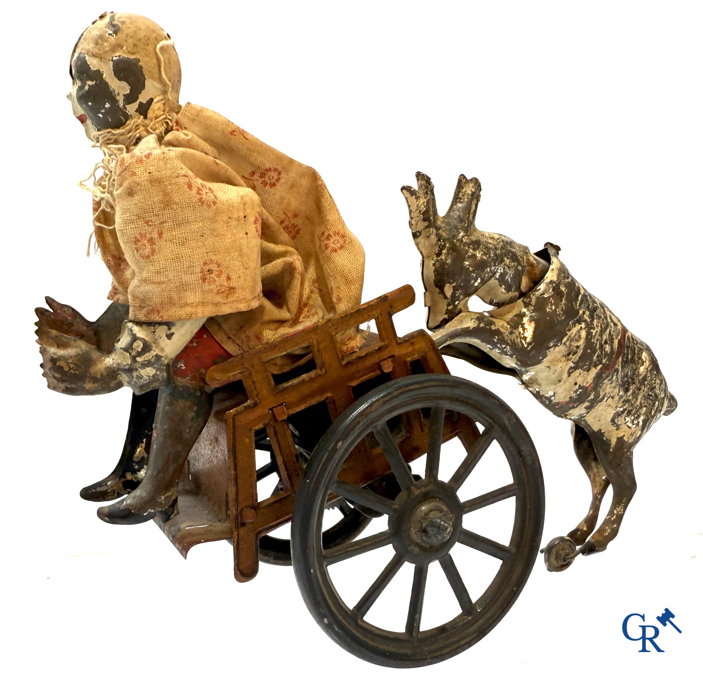 Günthermann. A mechanically painted tin toy, pierrot with goat. Germany circa 1910.