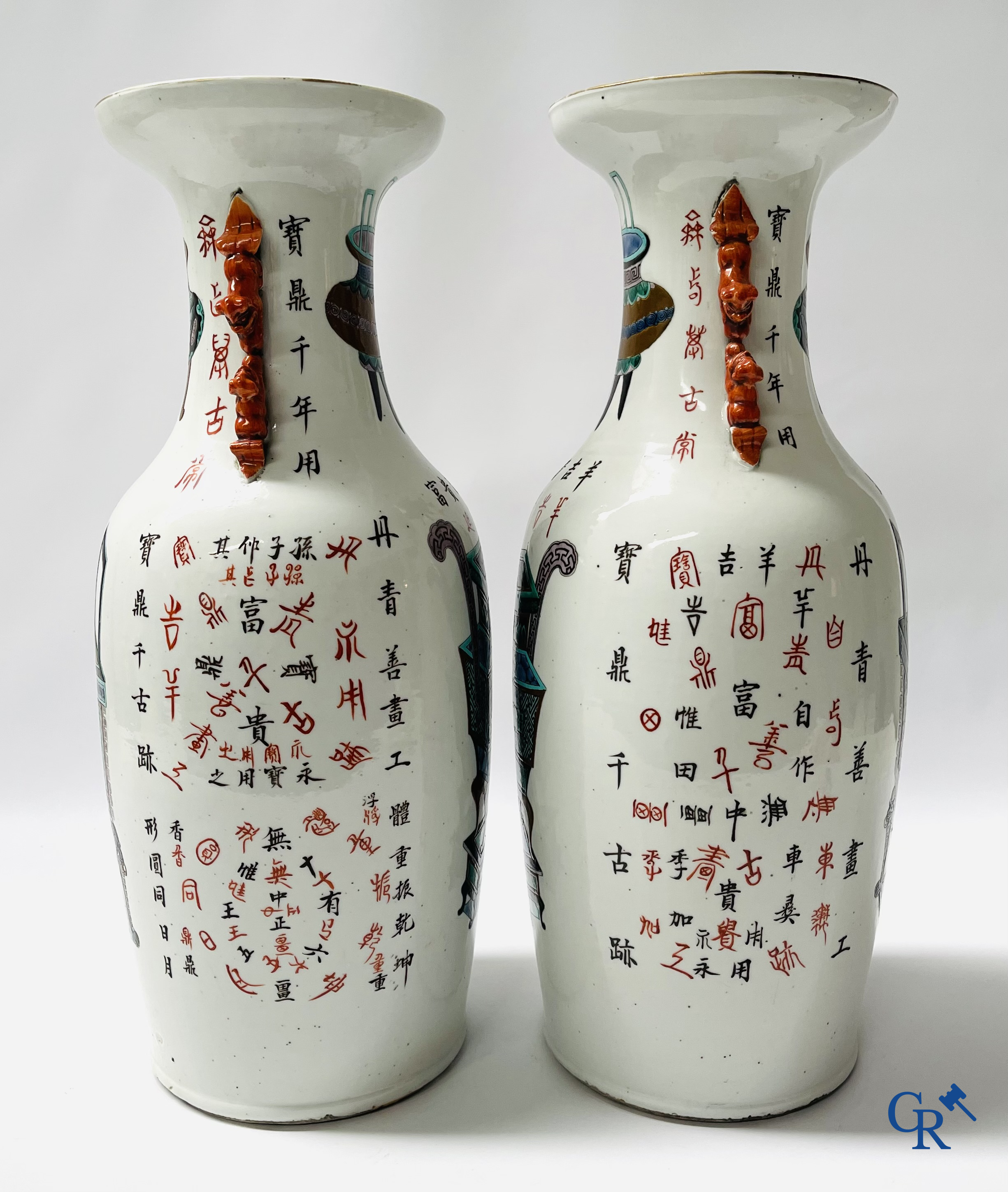 Asian Art, 2 Chinese famille rose vases decorated with antiques and a calligraphic text. 19th century.