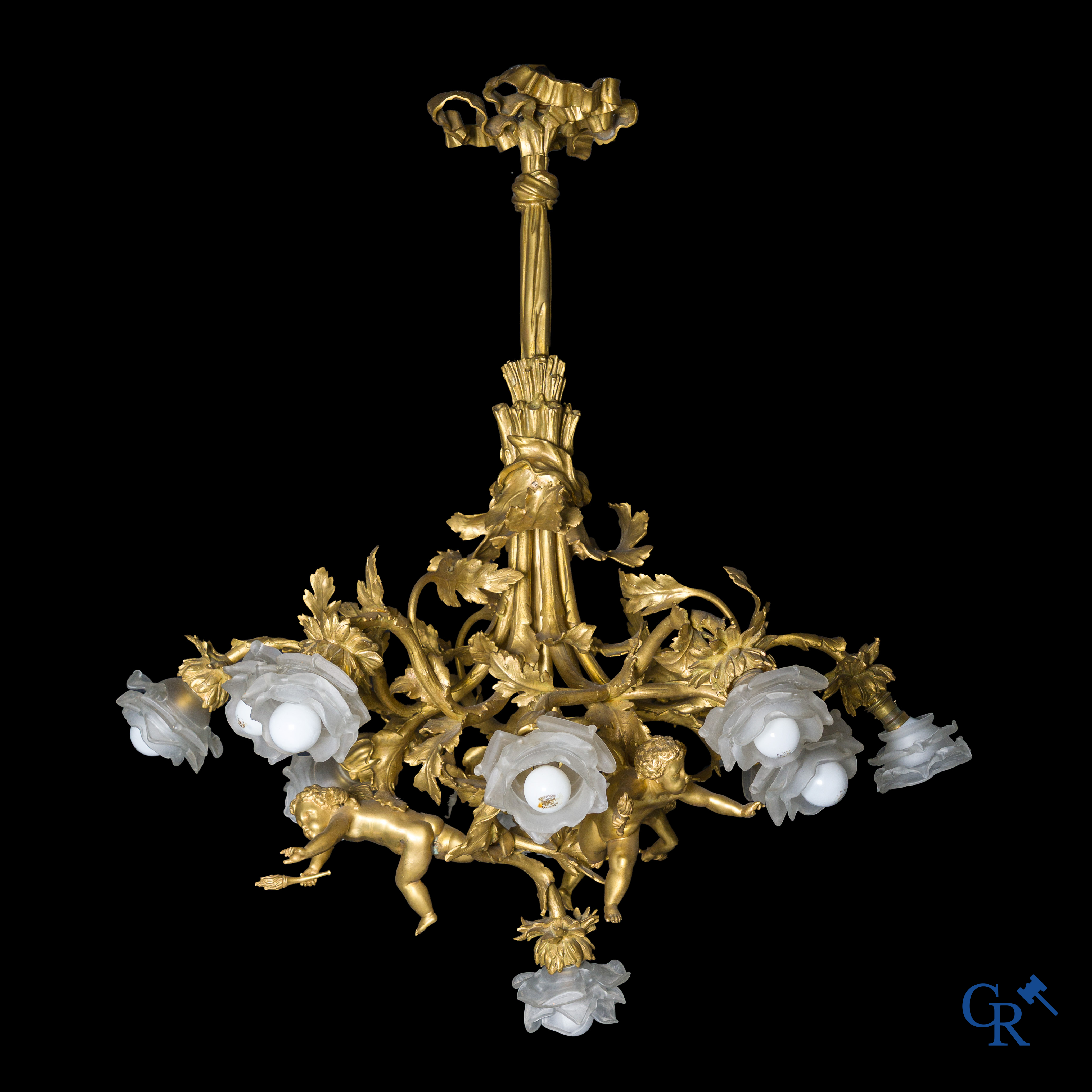 An imposing bronze gilded Napoleon III chandelier with 3 putti and 13 light points. LXVI style.
