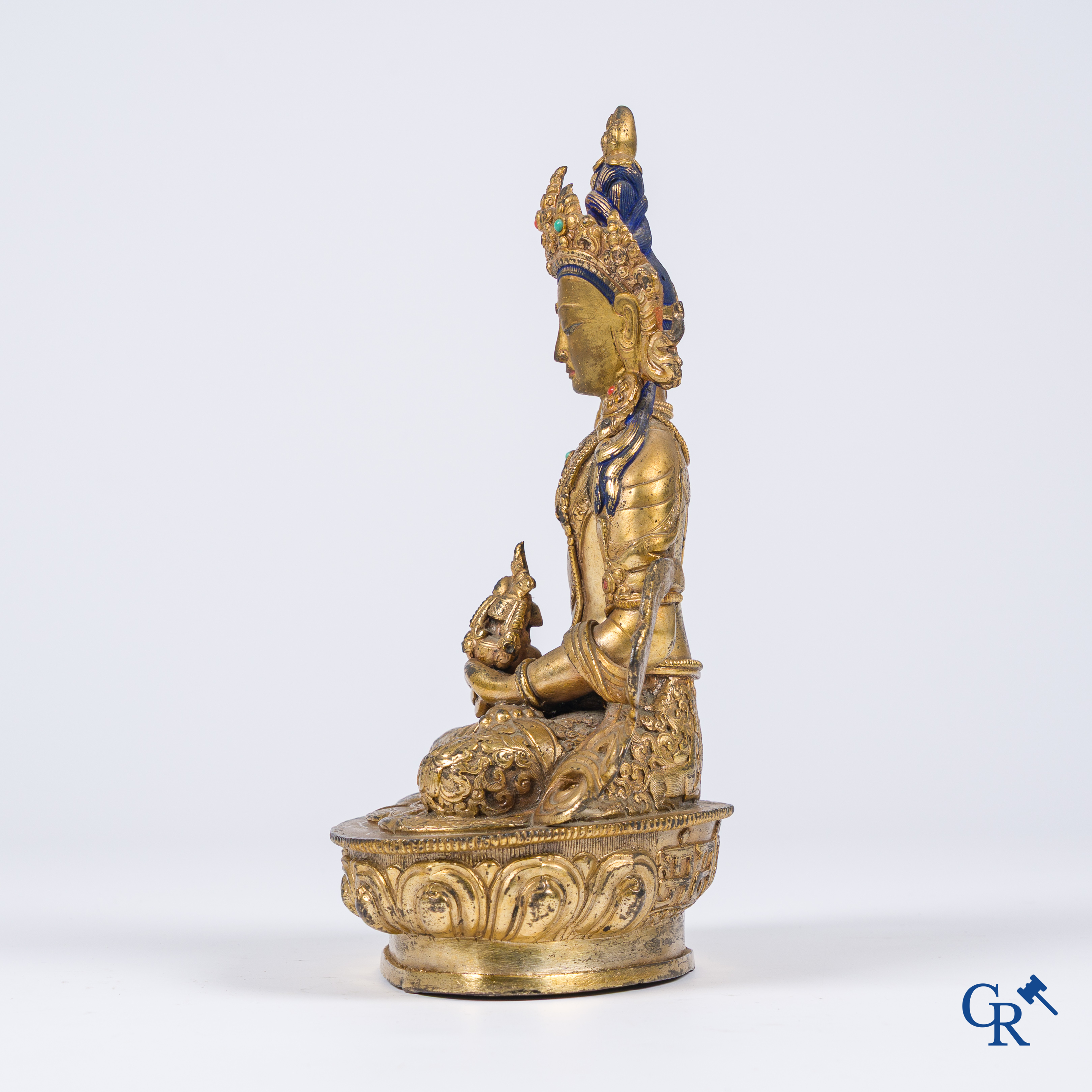Asian Art, Tibet, a Chinese gilded Buddha Amitayus. Bronze with turquoise and coral inlay.