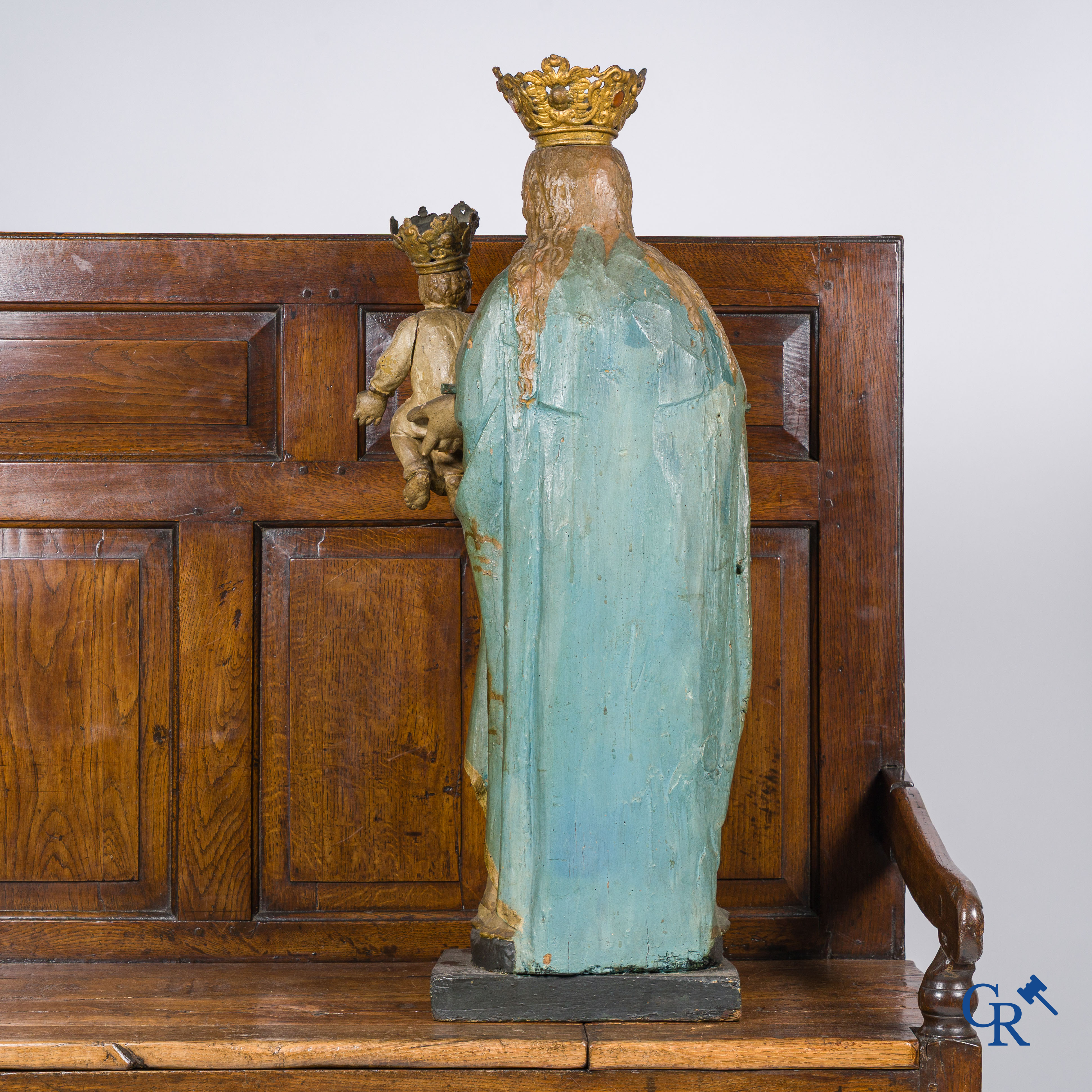 Wooden polychrome Baroque sculpture of Mary with child. The Crown inlaid with an amber-like rock.