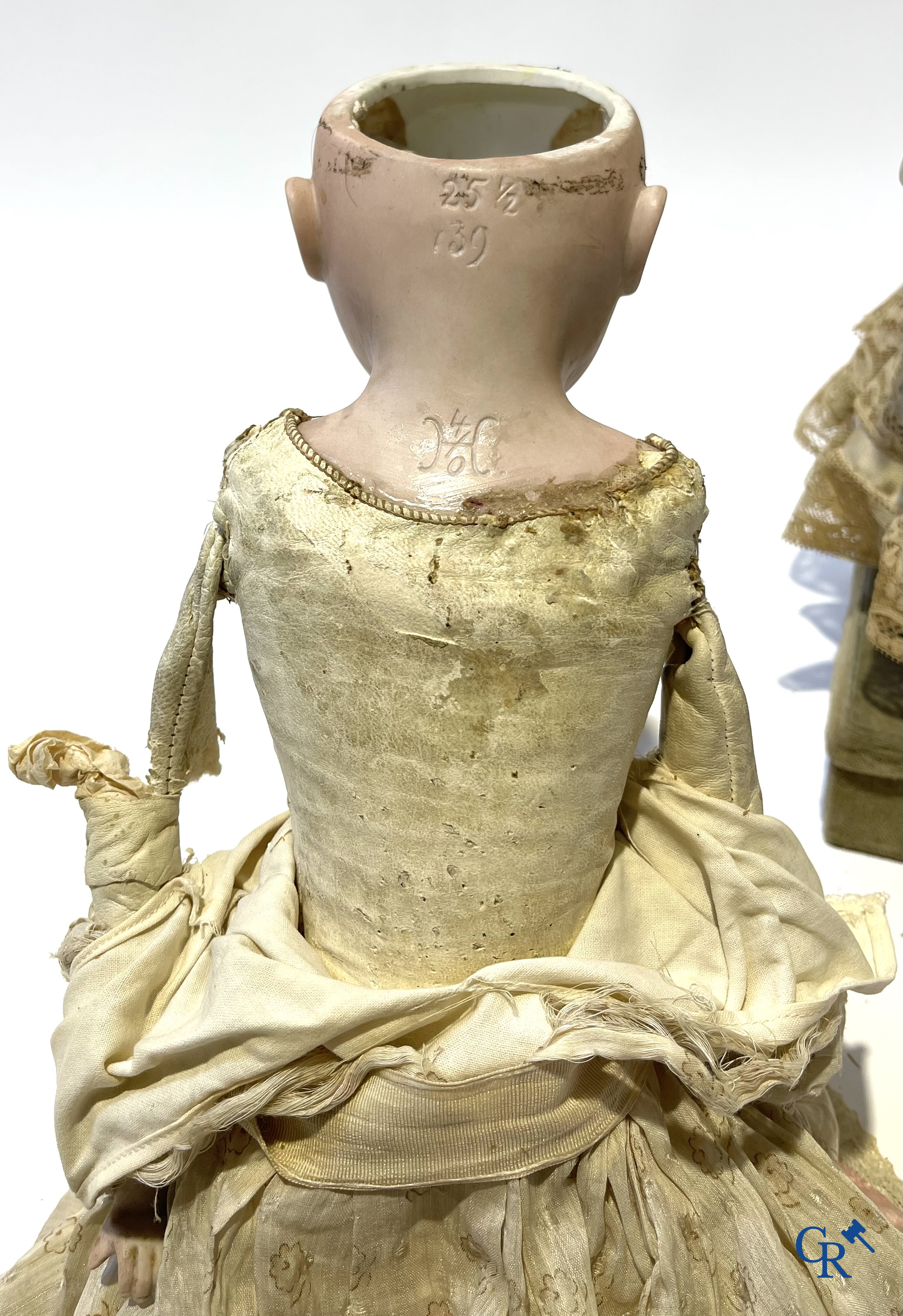 Old toys, 2 antique dolls with porcelain head and an automaton with music. Marked.