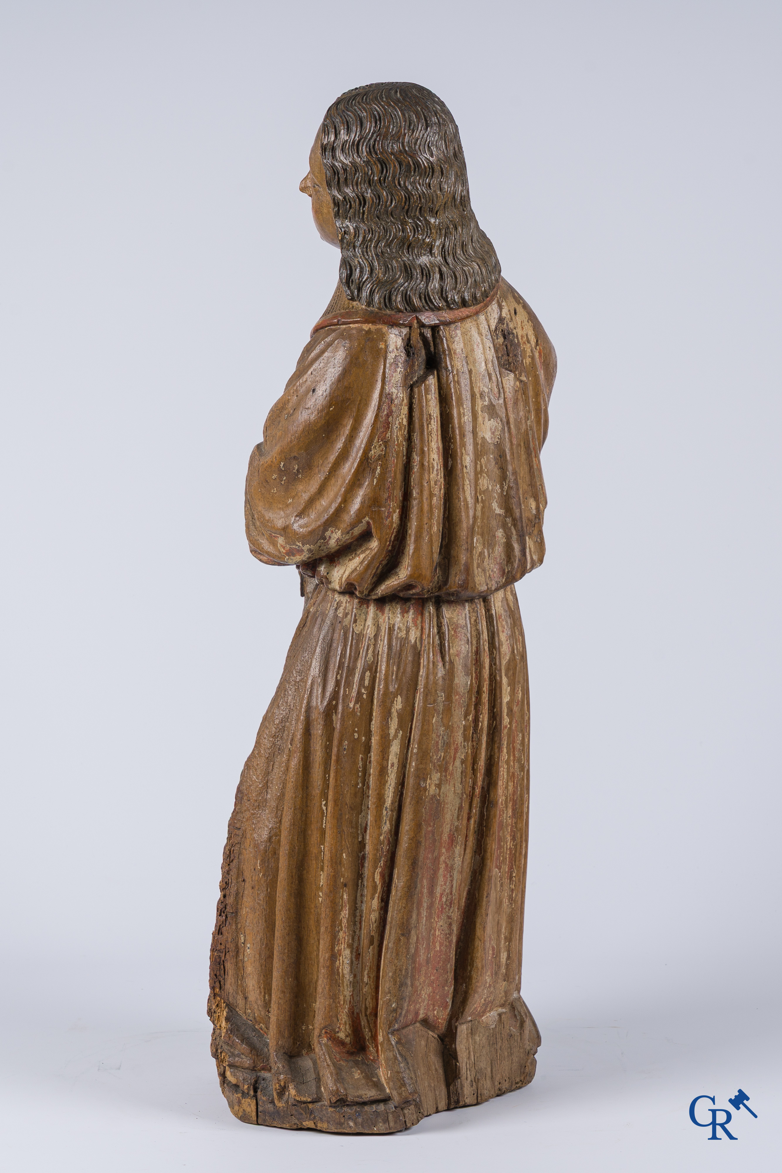 Religious objects, an antique wood carved representation of an archangel. Traces of polychromy.