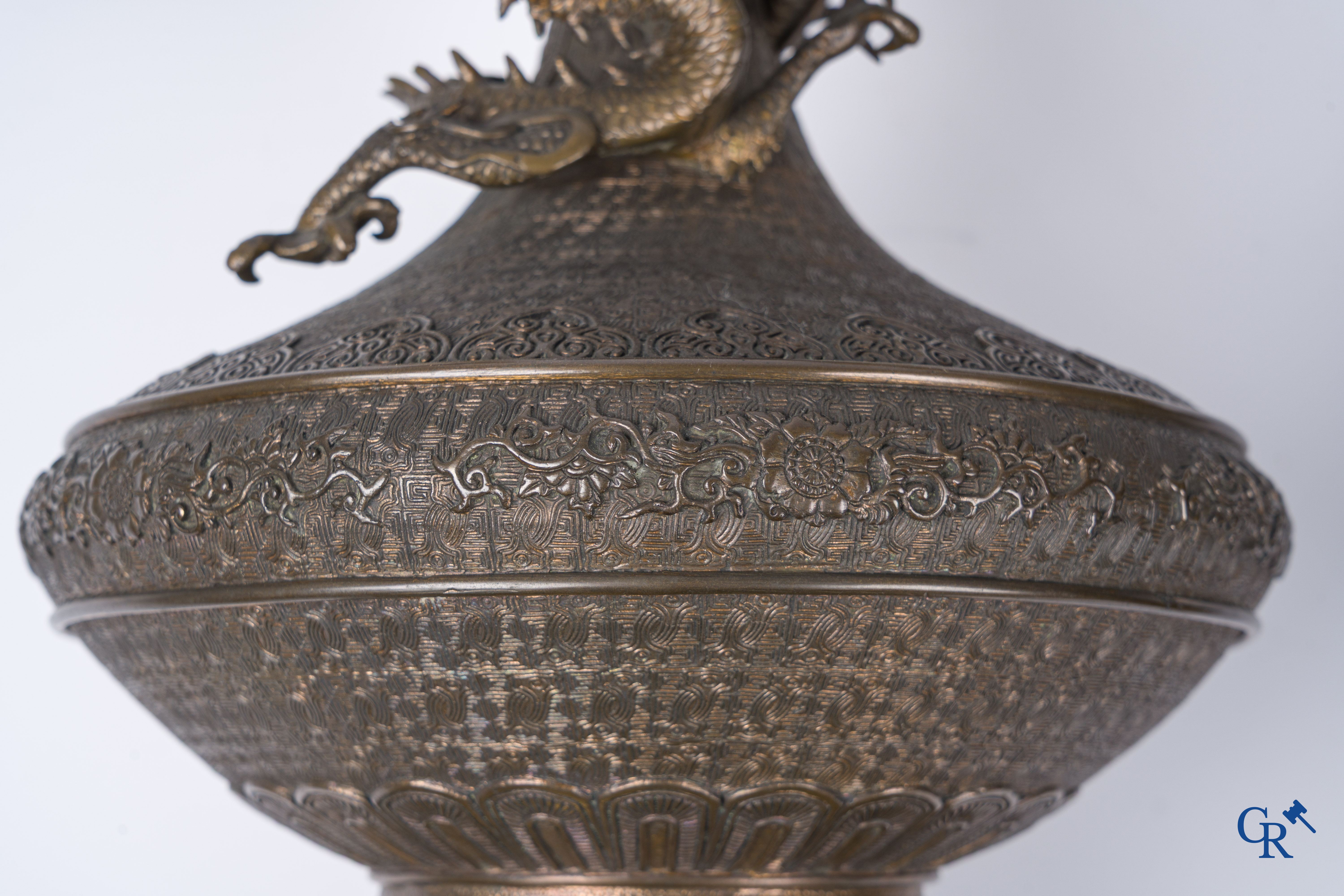 Asian Art, A pair of bronze candlesticks with finely crafted Oriental vases with dragons, circa 1880.