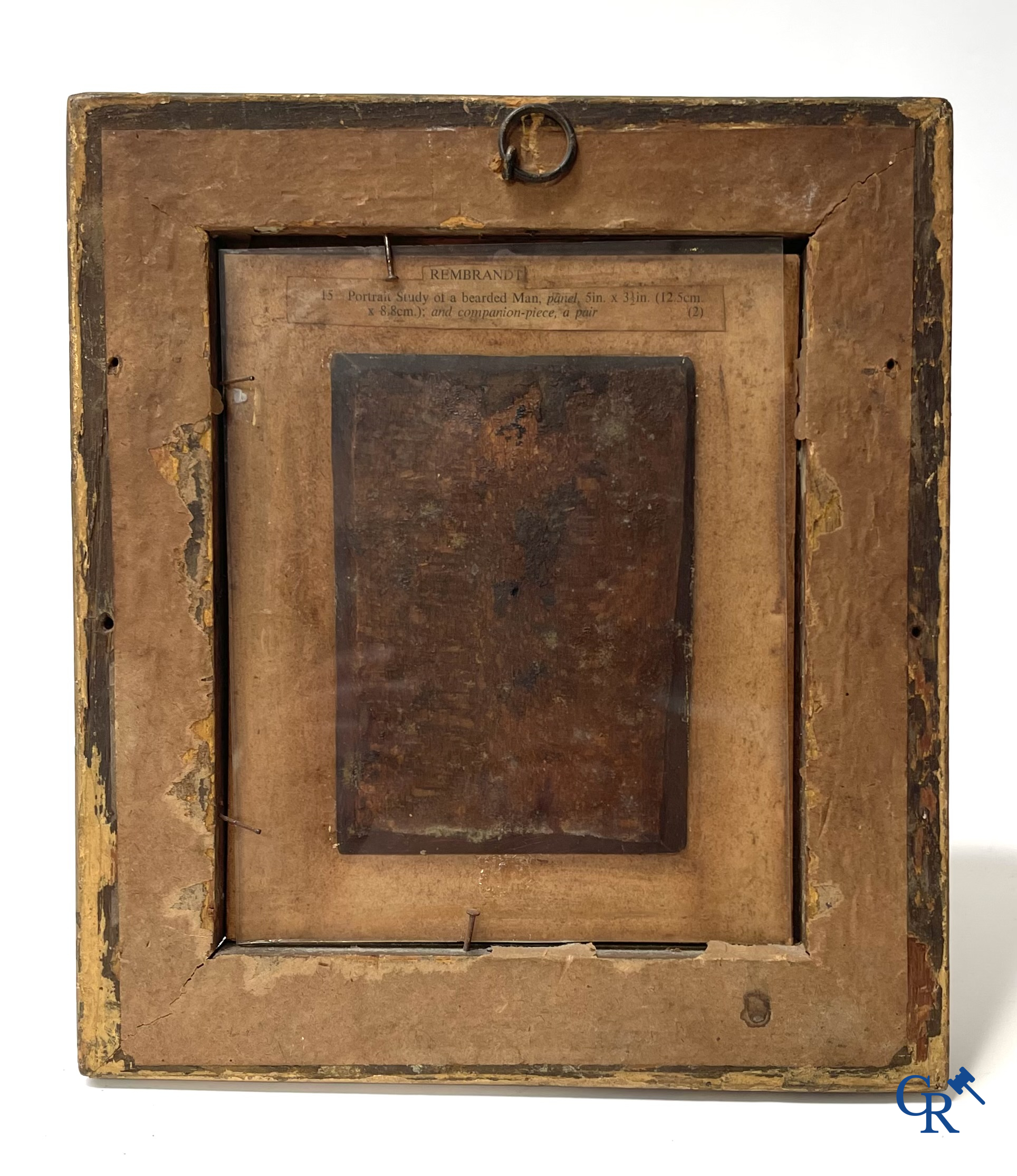 A pair of portrait paintings after Rembrandt Van Rijn, oil on panel, 2 portrait pen drawings attached. 19th century.