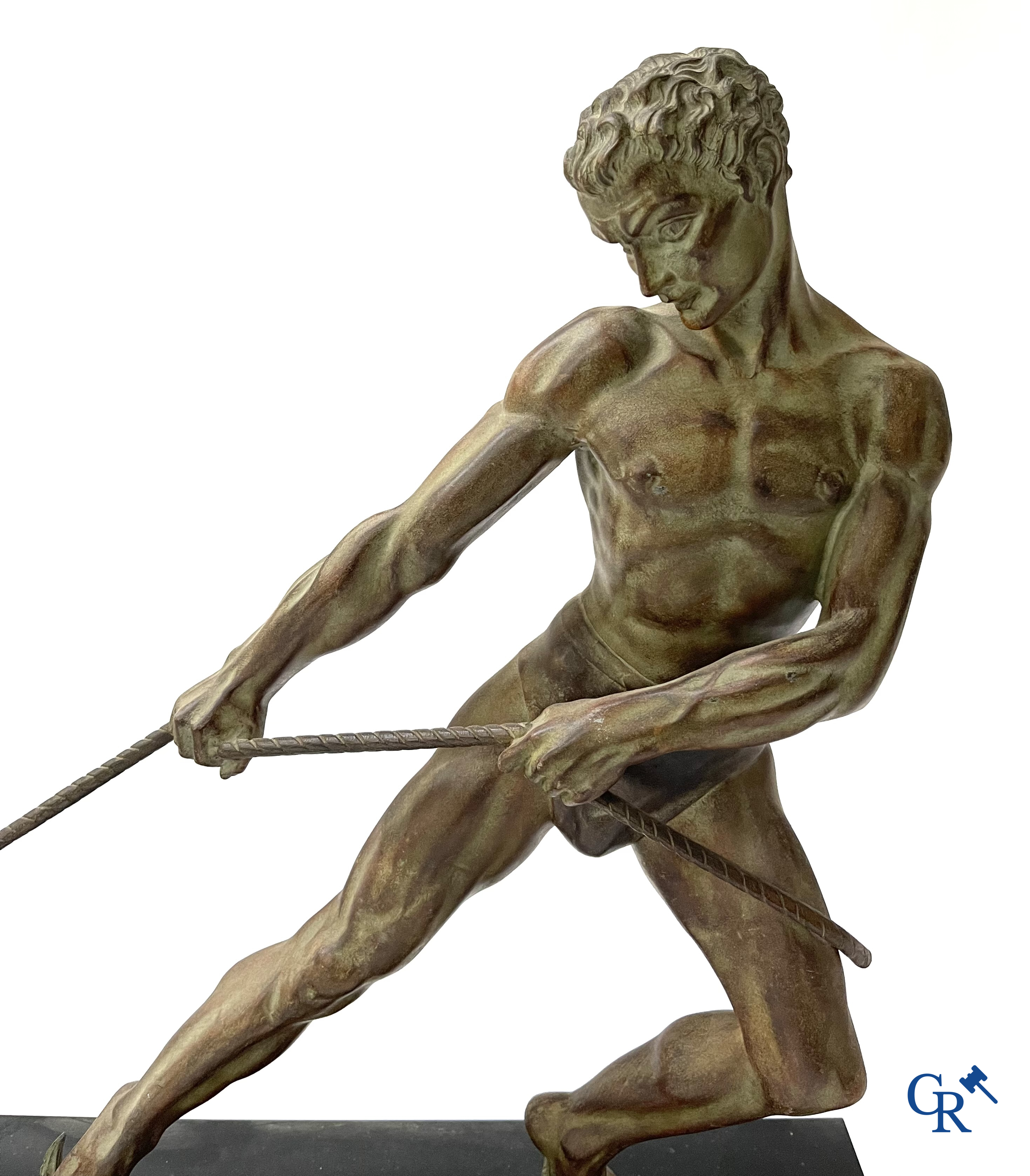 Art deco, a statue in green-brown patinated spelter on a black marble base. Around 1930.