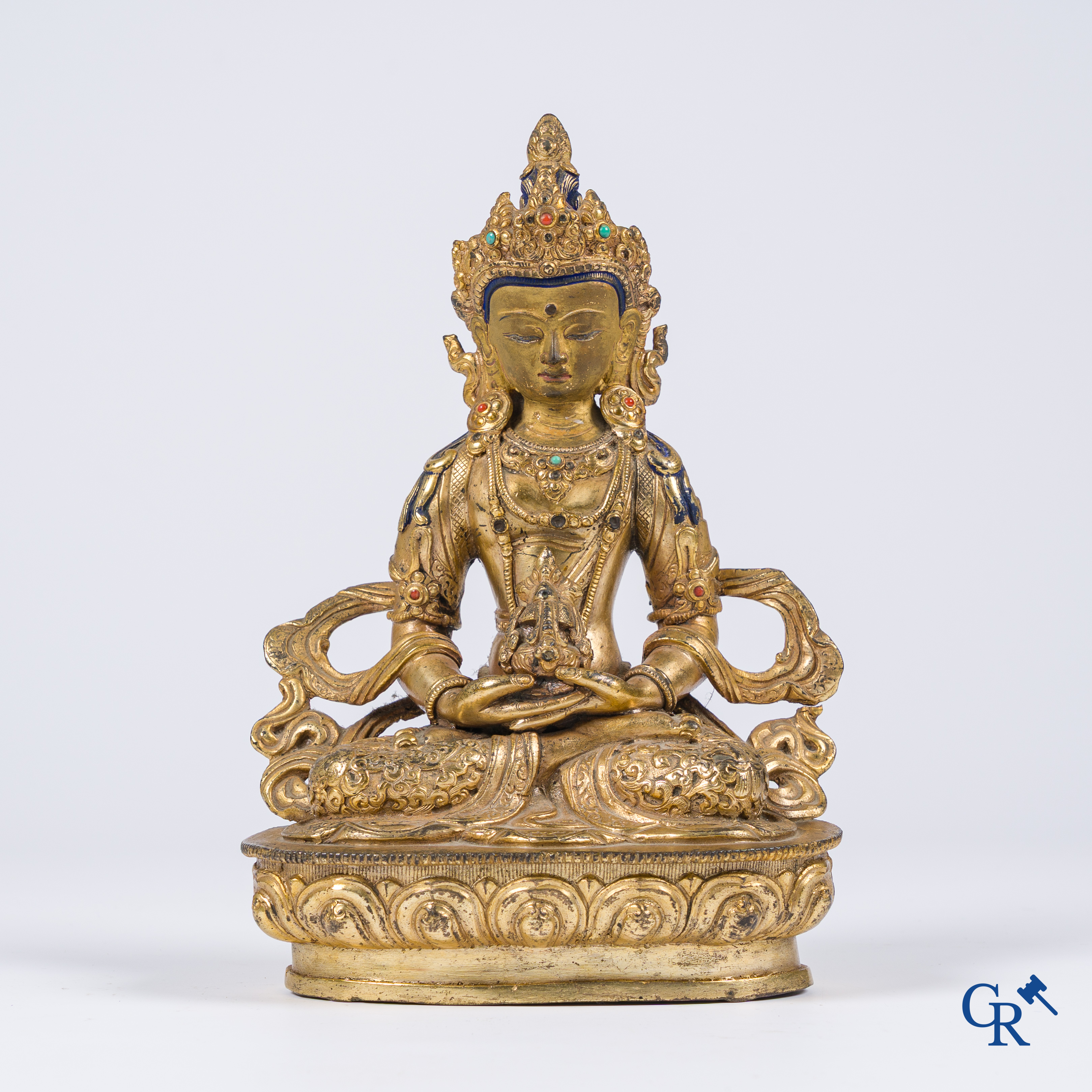 Asian Art, Tibet, a Chinese gilded Buddha Amitayus. Bronze with turquoise and coral inlay.