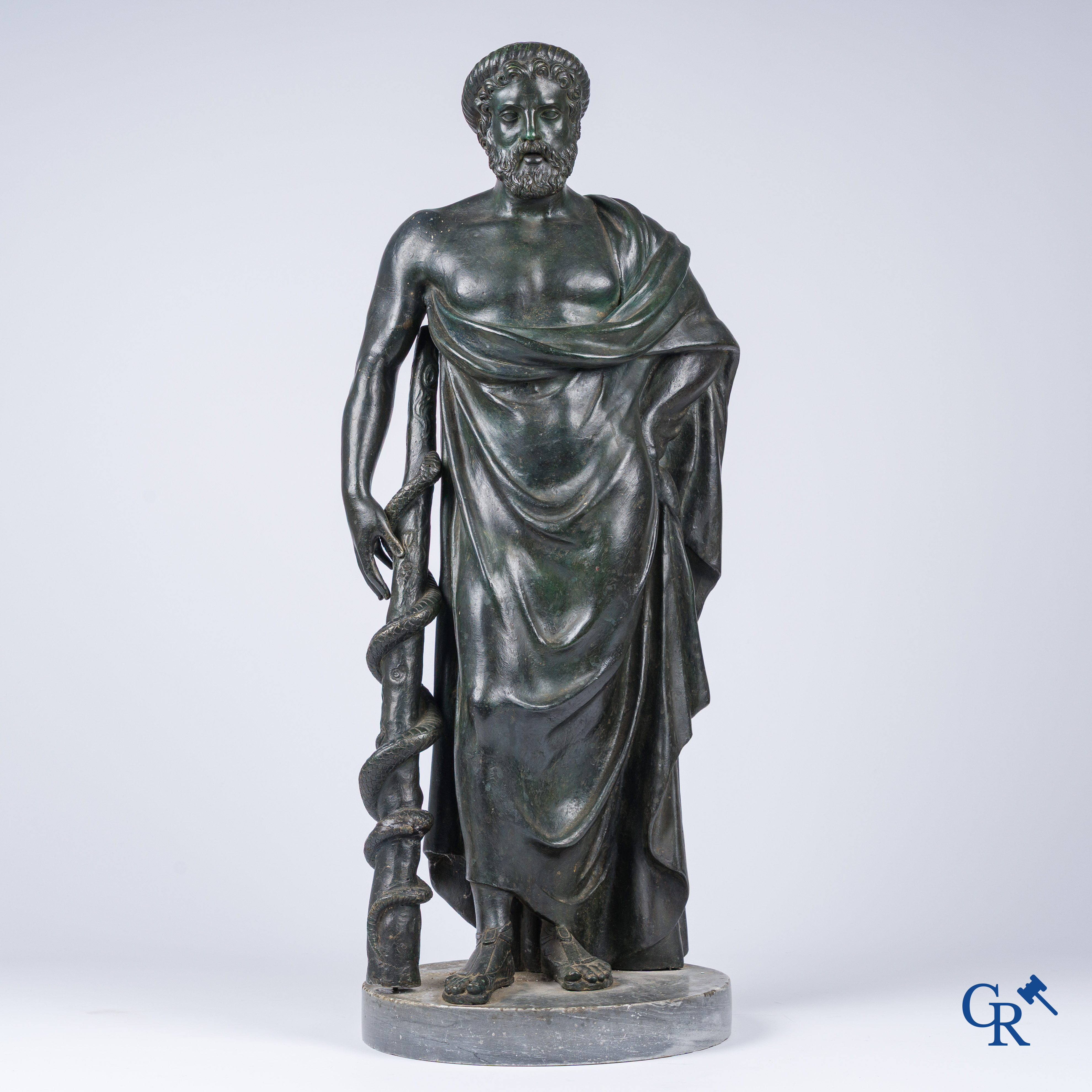Asklepios. Greek god of medicine and healing. Pedestal in grey St. Anna marble. Late 18th - Early 19th century.