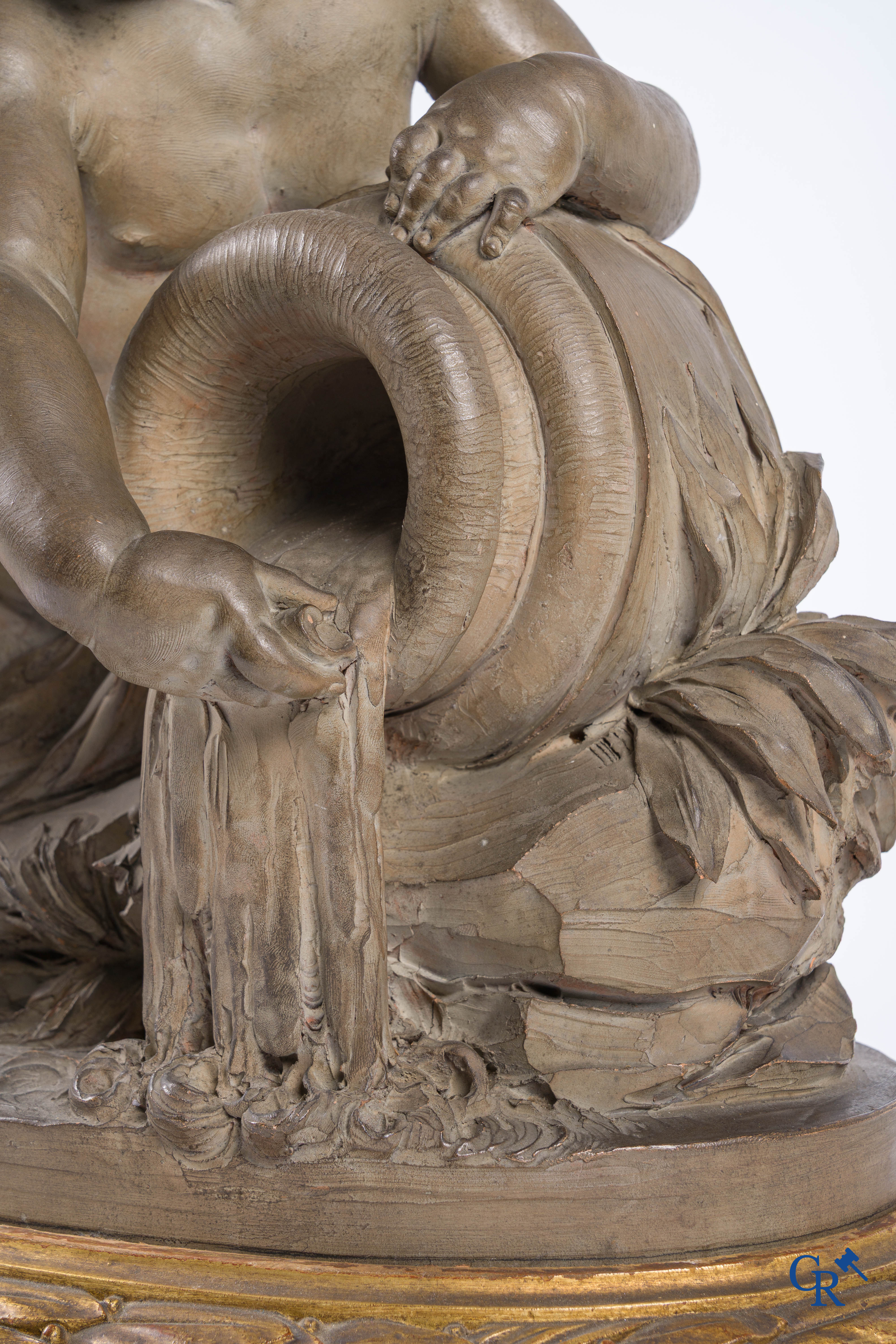 "La Source" A large terra cotta group on a wooden gilded pedestal. LXVI style. 19th century.