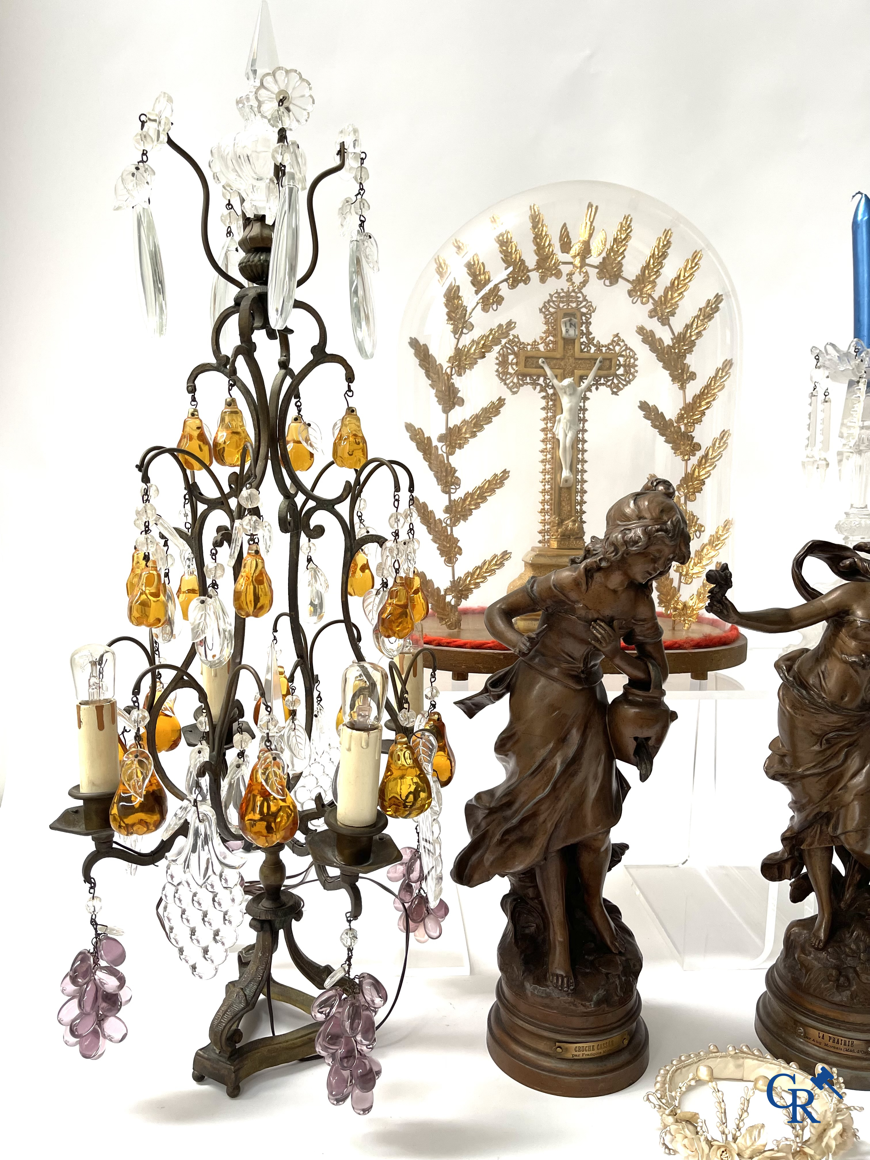 A large lot of brocante including Royal Dux, Biscuit statues, porcelain, globes, spelter statues, table lamp, chandelier etc.