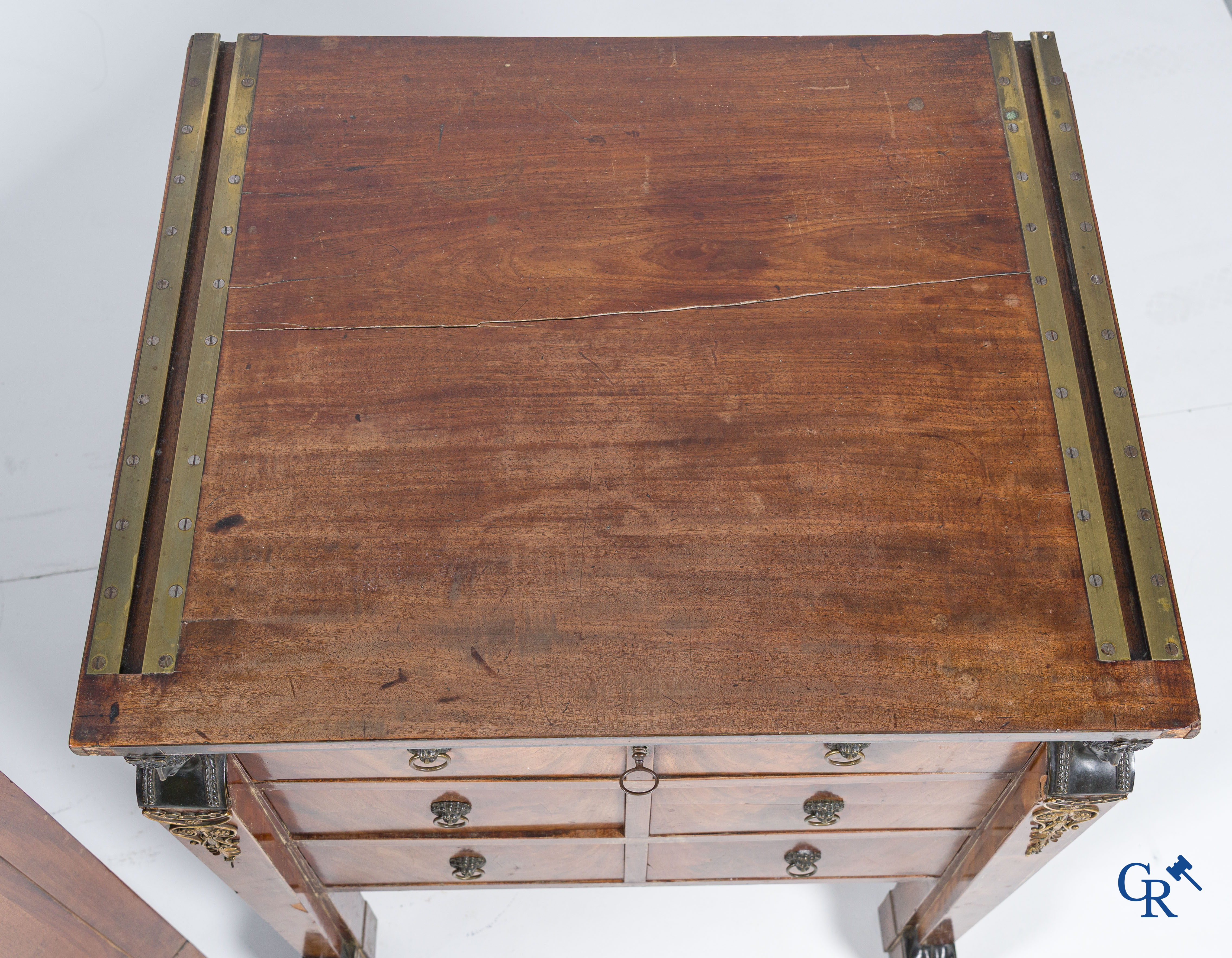 Chapuis, a mahogany wooden men's dressing table and ladies' dressing table with chiseled bronzes. Empire, circa 1810.