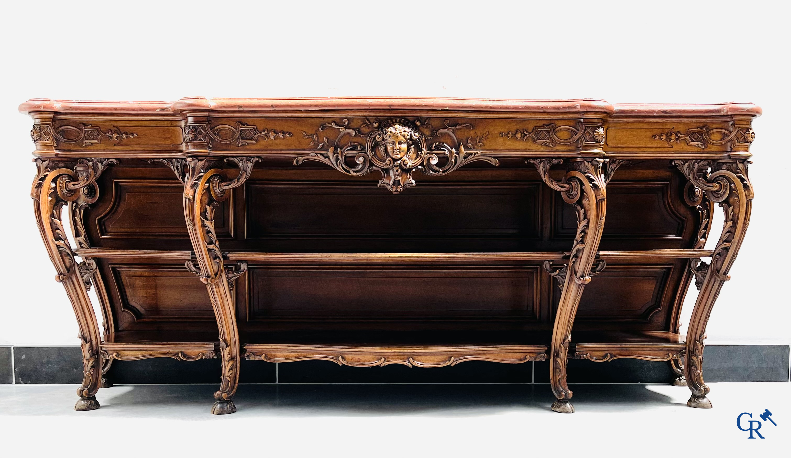 Maison Roll, 42, Rue Faubourg St. Antoine Paris. An exceptionally dessert furniture in carved walnut. LXVI style.