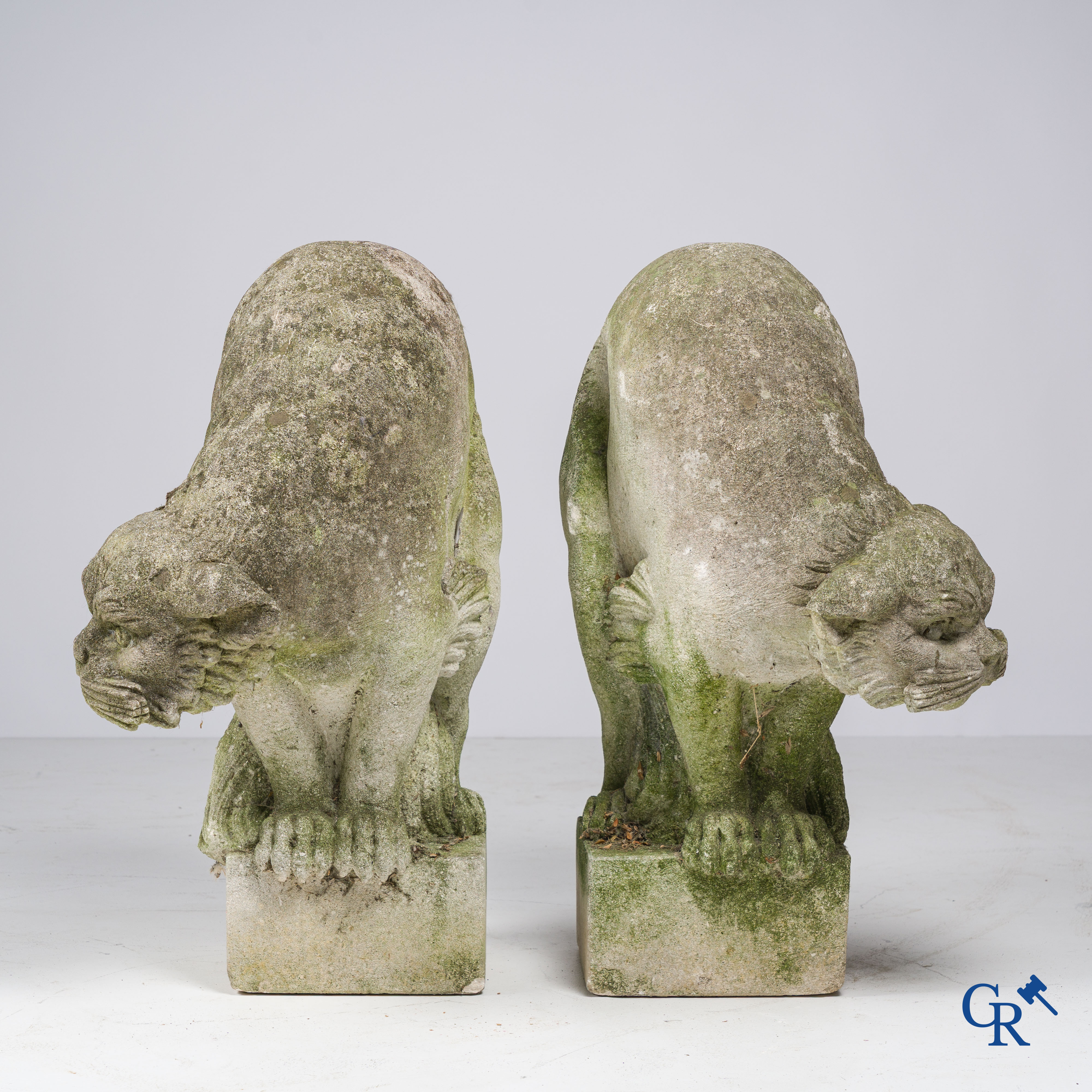 Exceptionally pair of large ornaments depicting cats in hand-sculpted limestone. Circa 1900.
