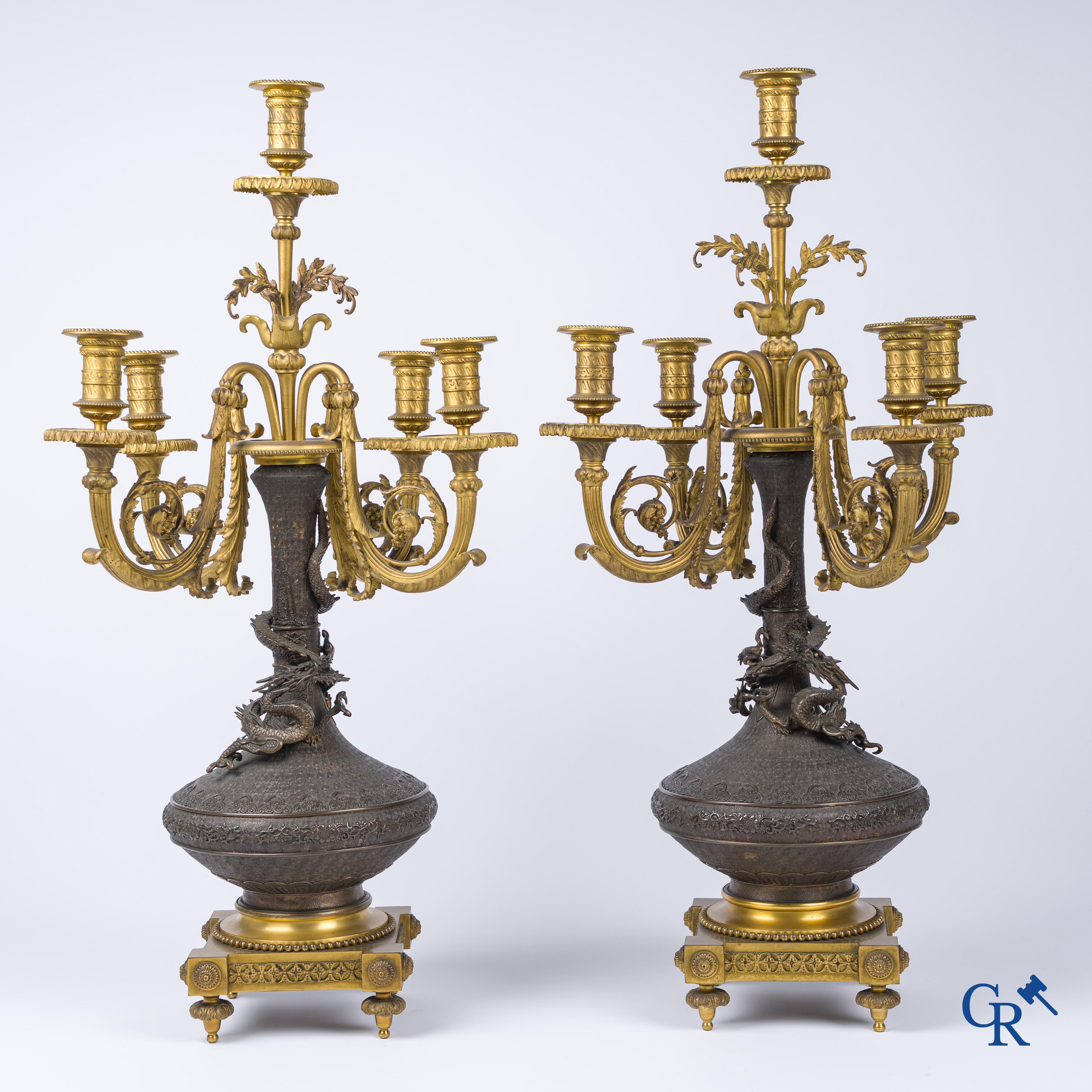 Asian Art, A pair of bronze candlesticks with finely crafted Oriental vases with dragons, circa 1880.