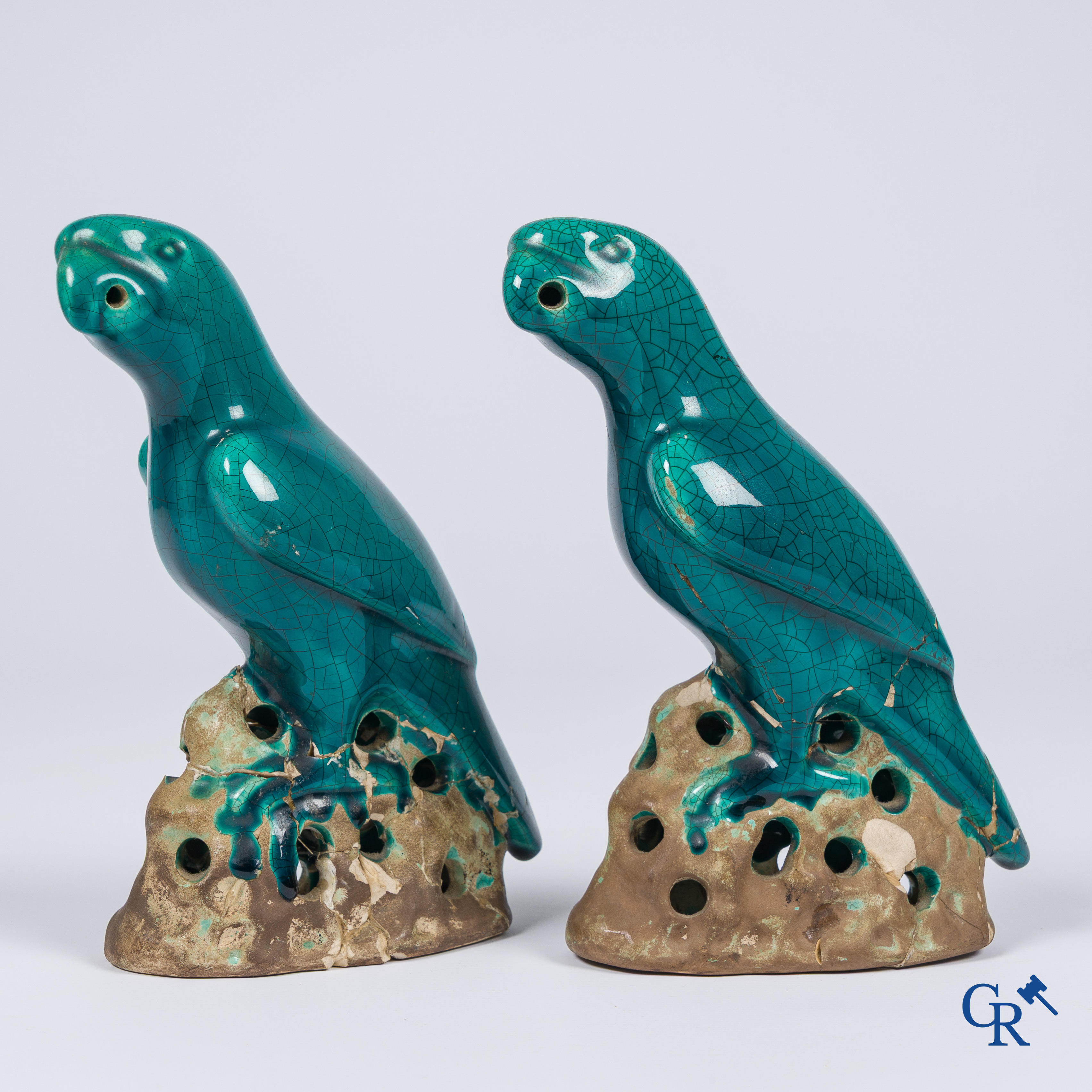 Asian Art, a pair of turquoise glazed ceramic parrots.