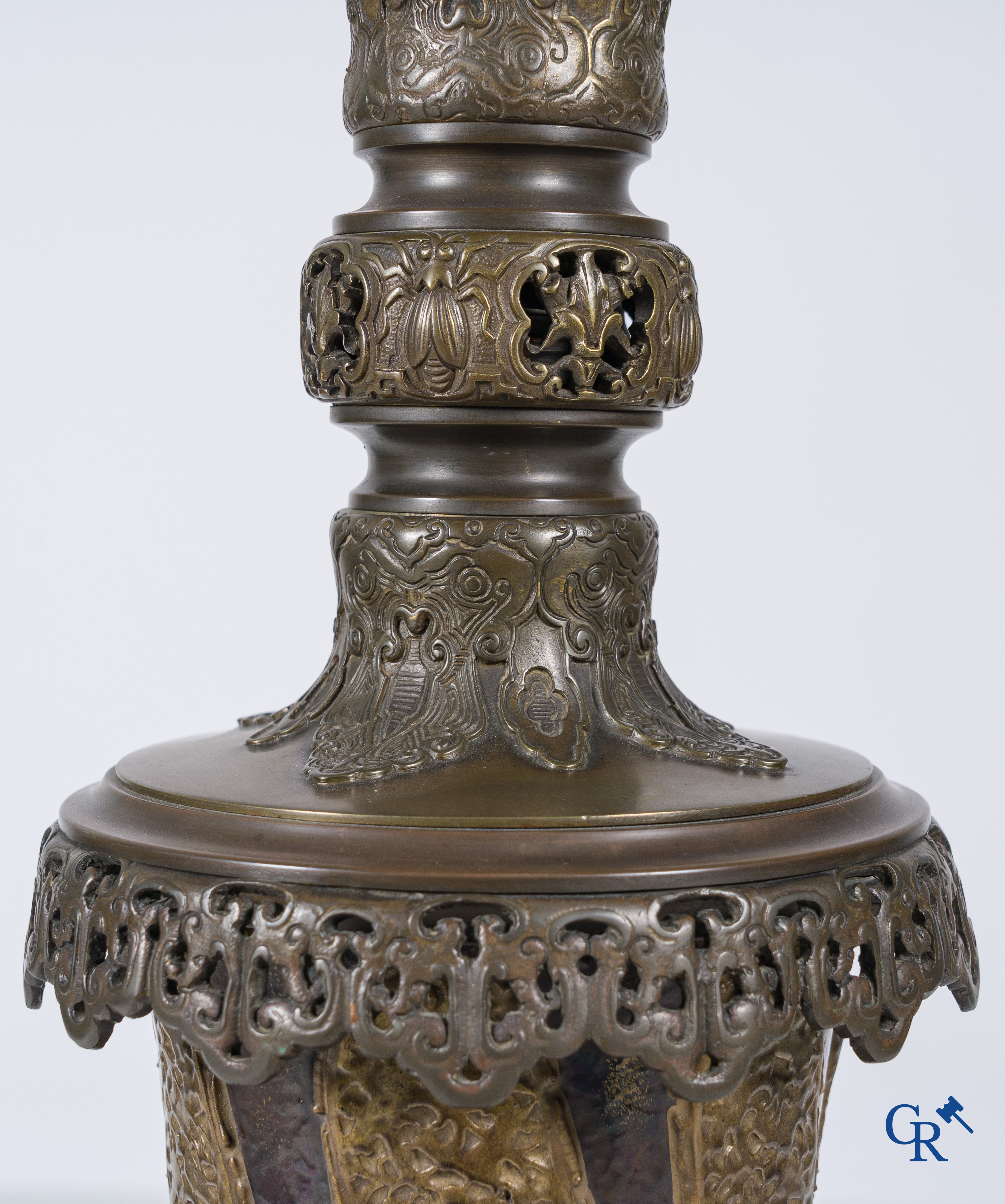 An imposing vase in French faience with bronze frames in Japonizing style mounted as a lamp. Circa 1890.