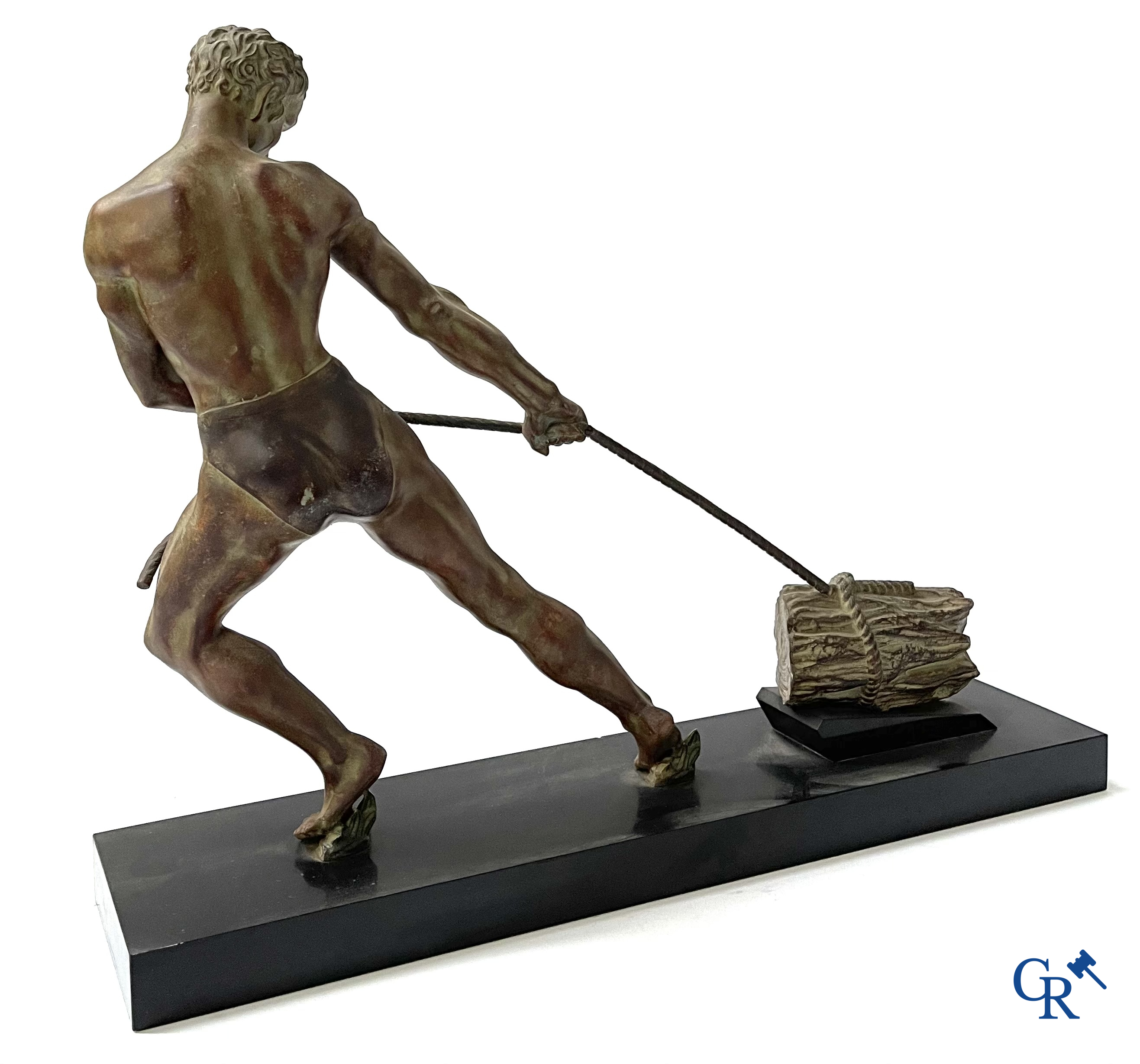 Art deco, a statue in green-brown patinated spelter on a black marble base. Around 1930.