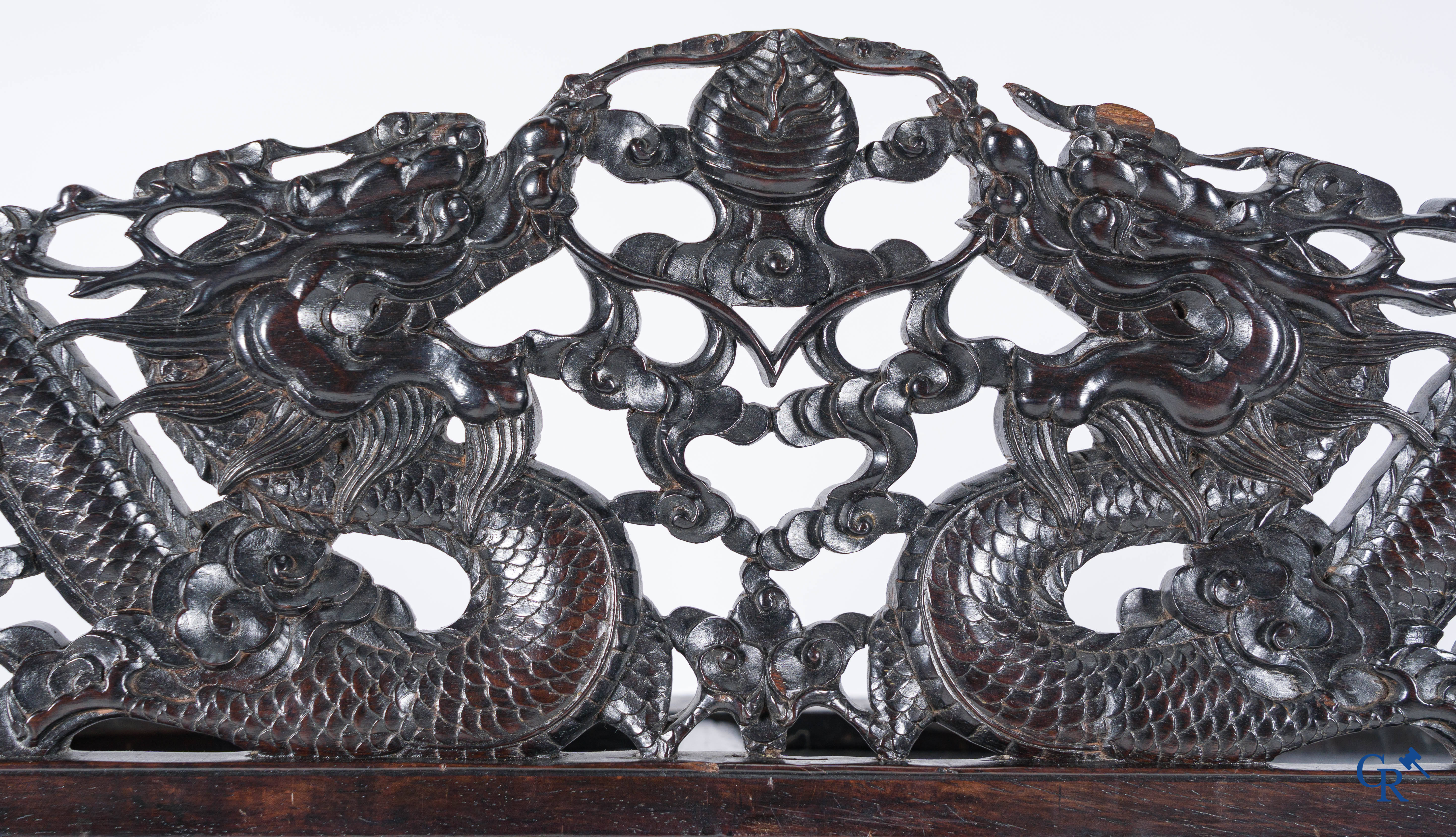 Asian Art, a 2-door display cabinet in finely carved Chinese hardwood. 19th century.
