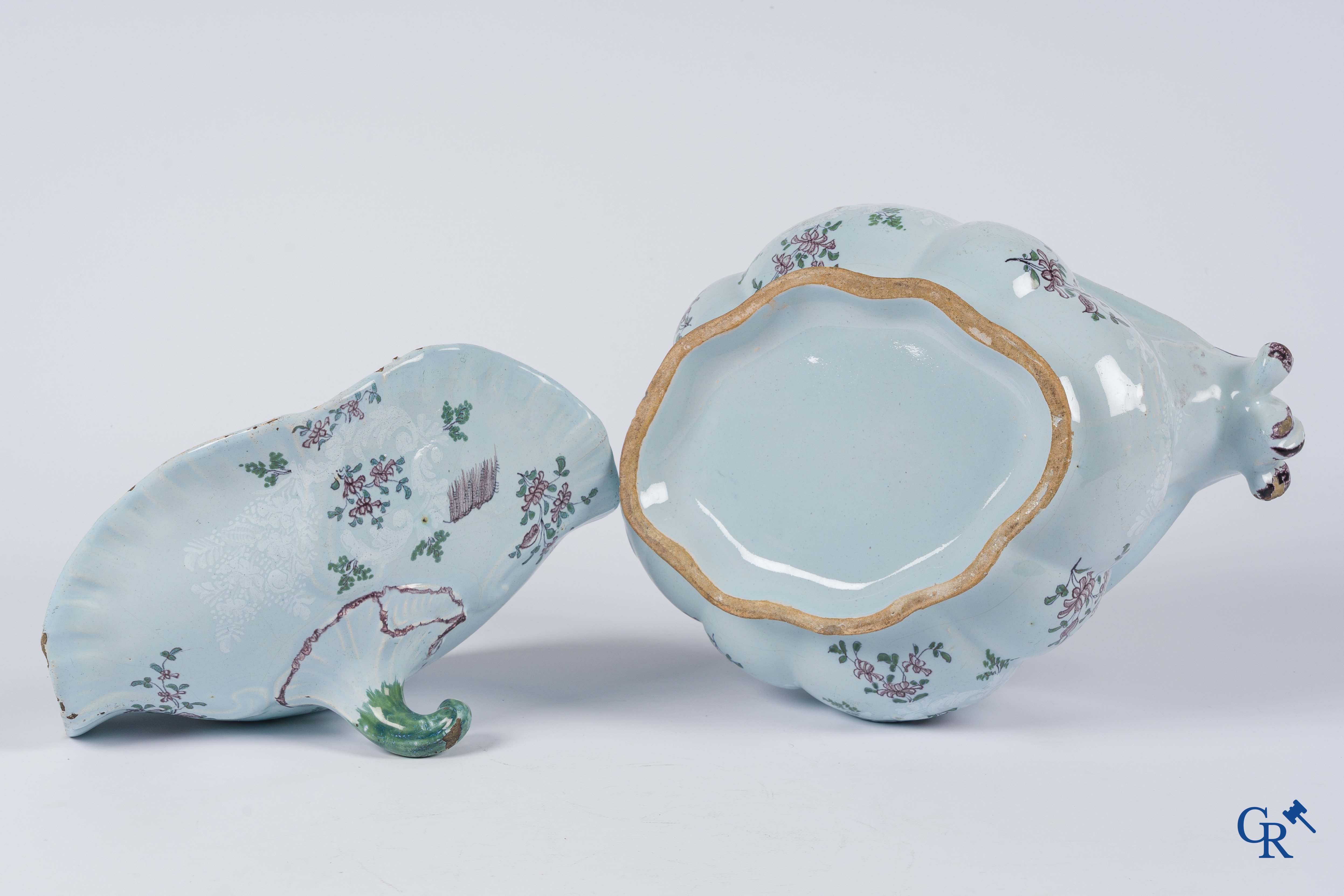 Earthenware. A large 18th century tureen and its lid in enamelled faience.