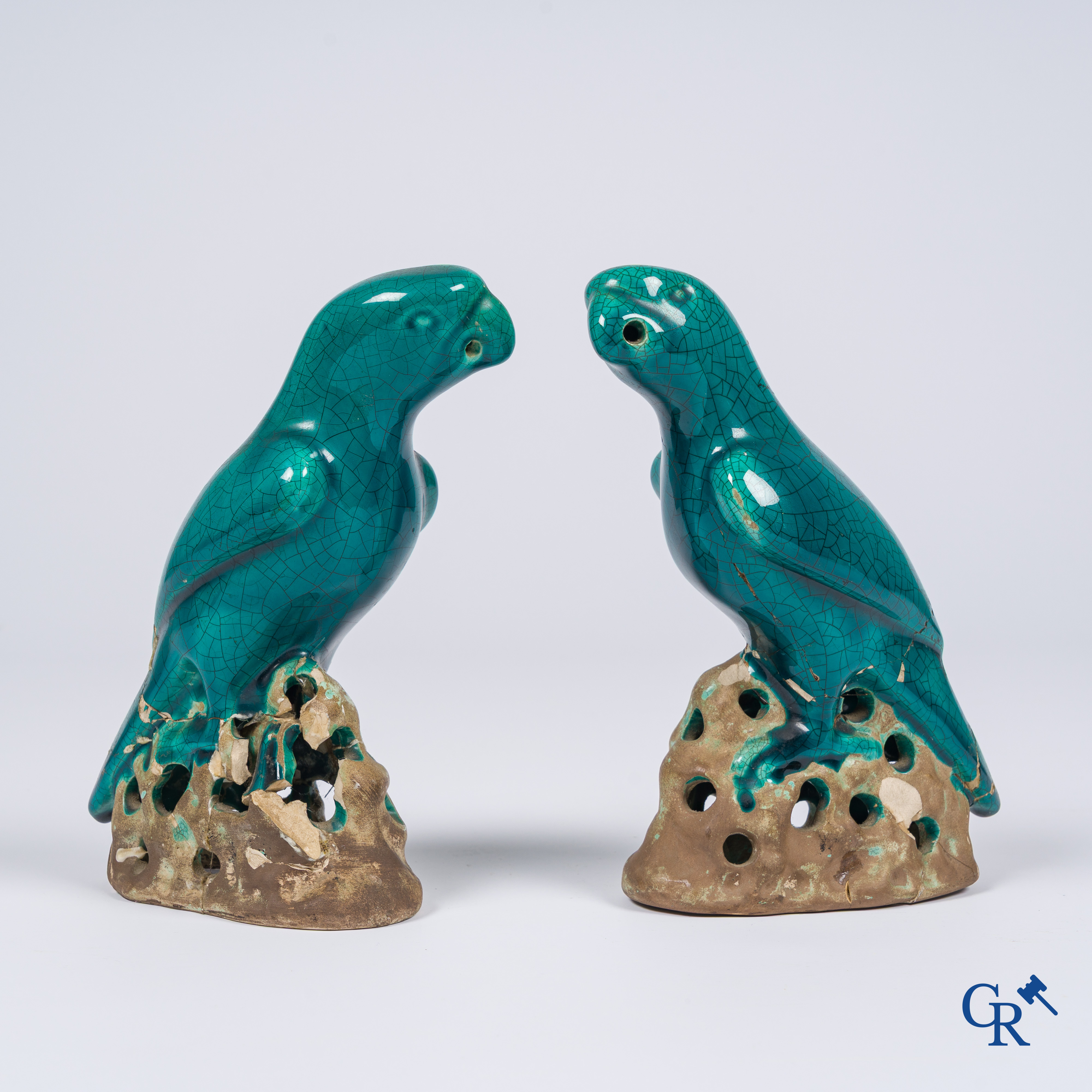 Asian Art, a pair of turquoise glazed ceramic parrots.